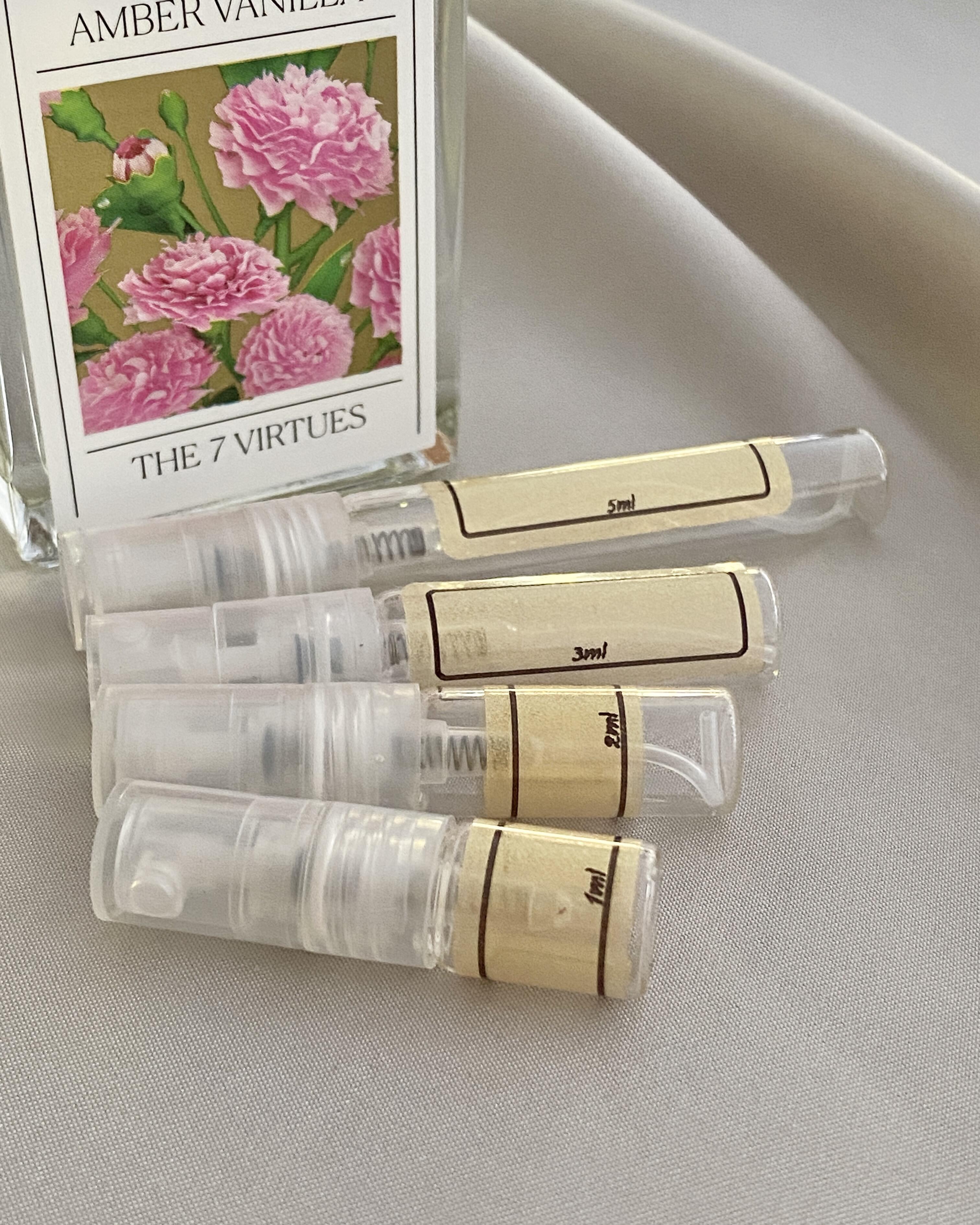 The 7 Virtues Amber Vanilla and sample bottles