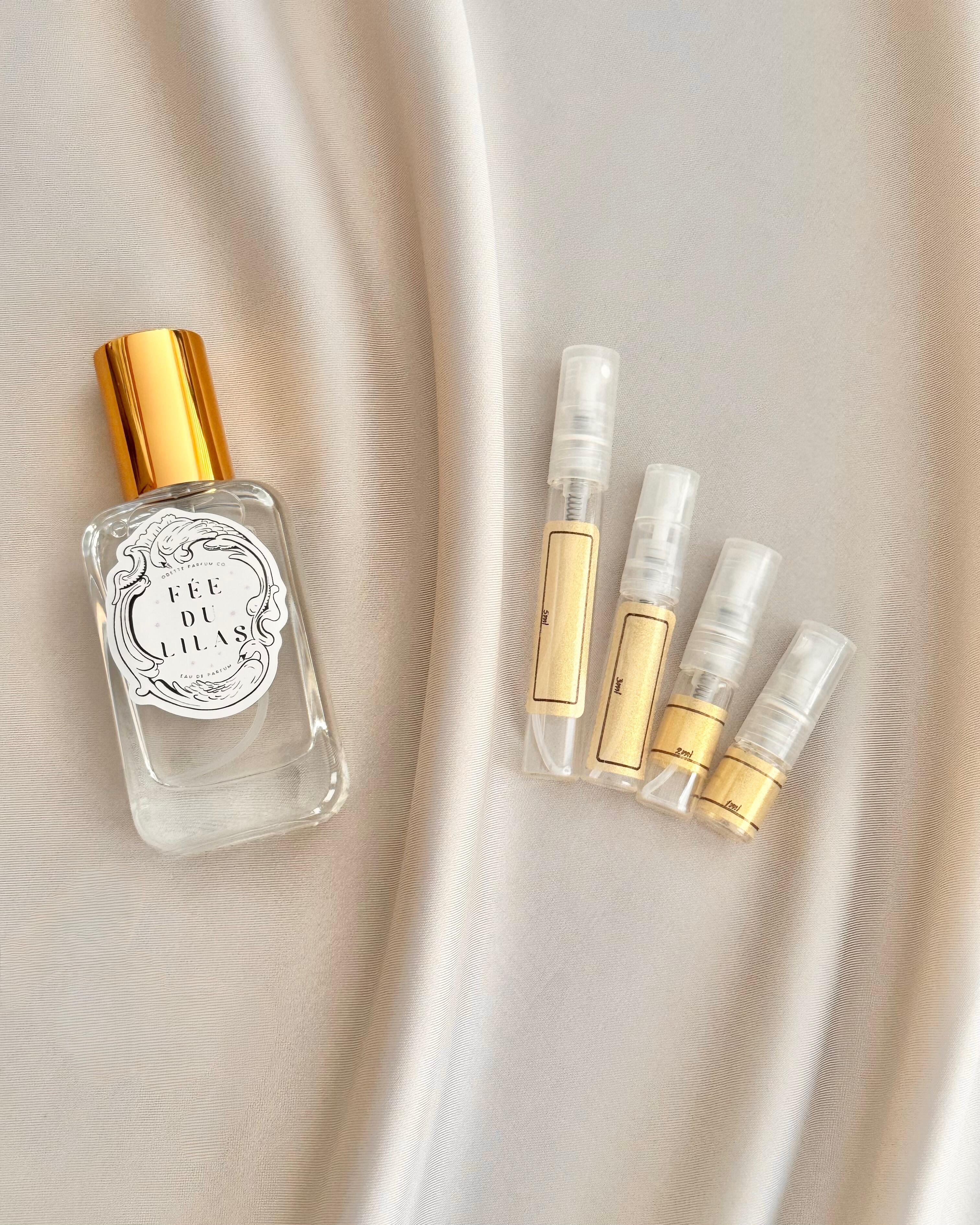 Odette Parfum Co Fee du Lilas with sample bottles