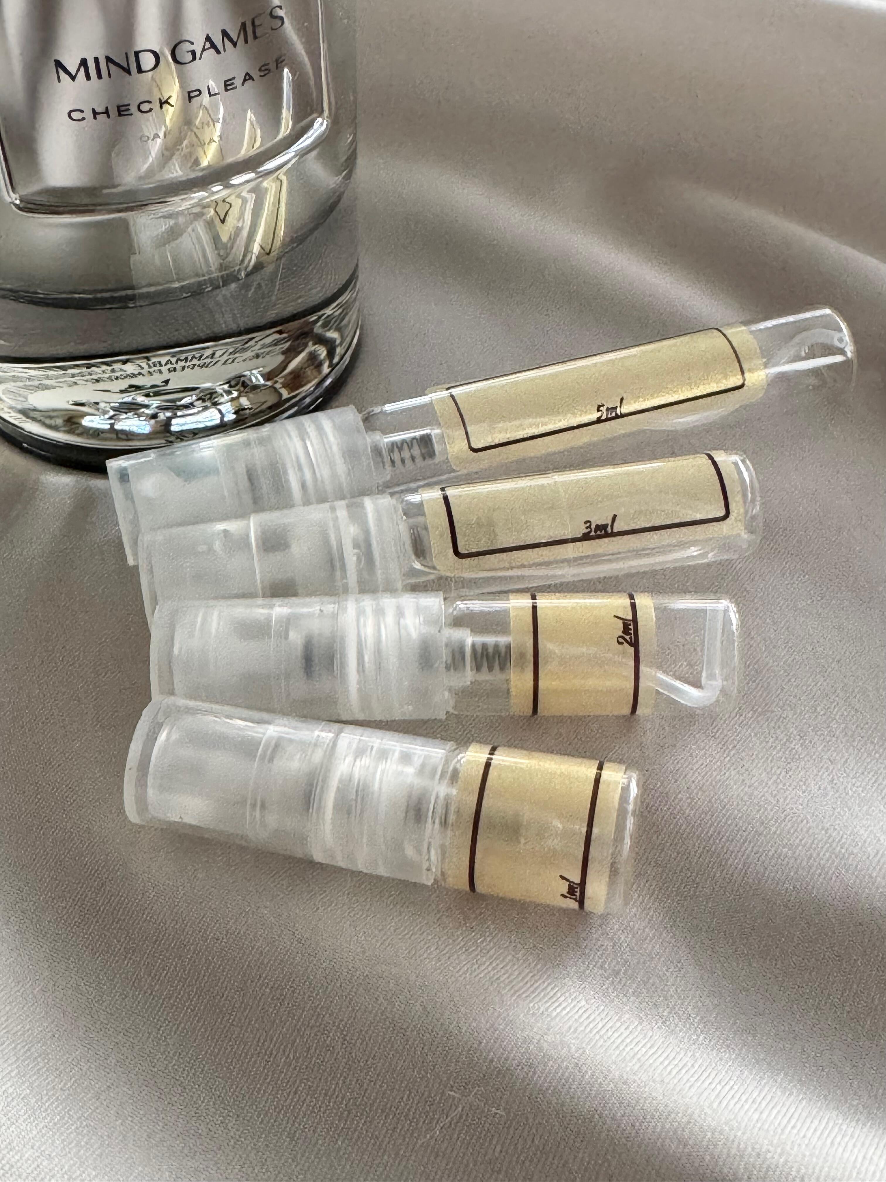 Mind Games Check Please and sample bottles
