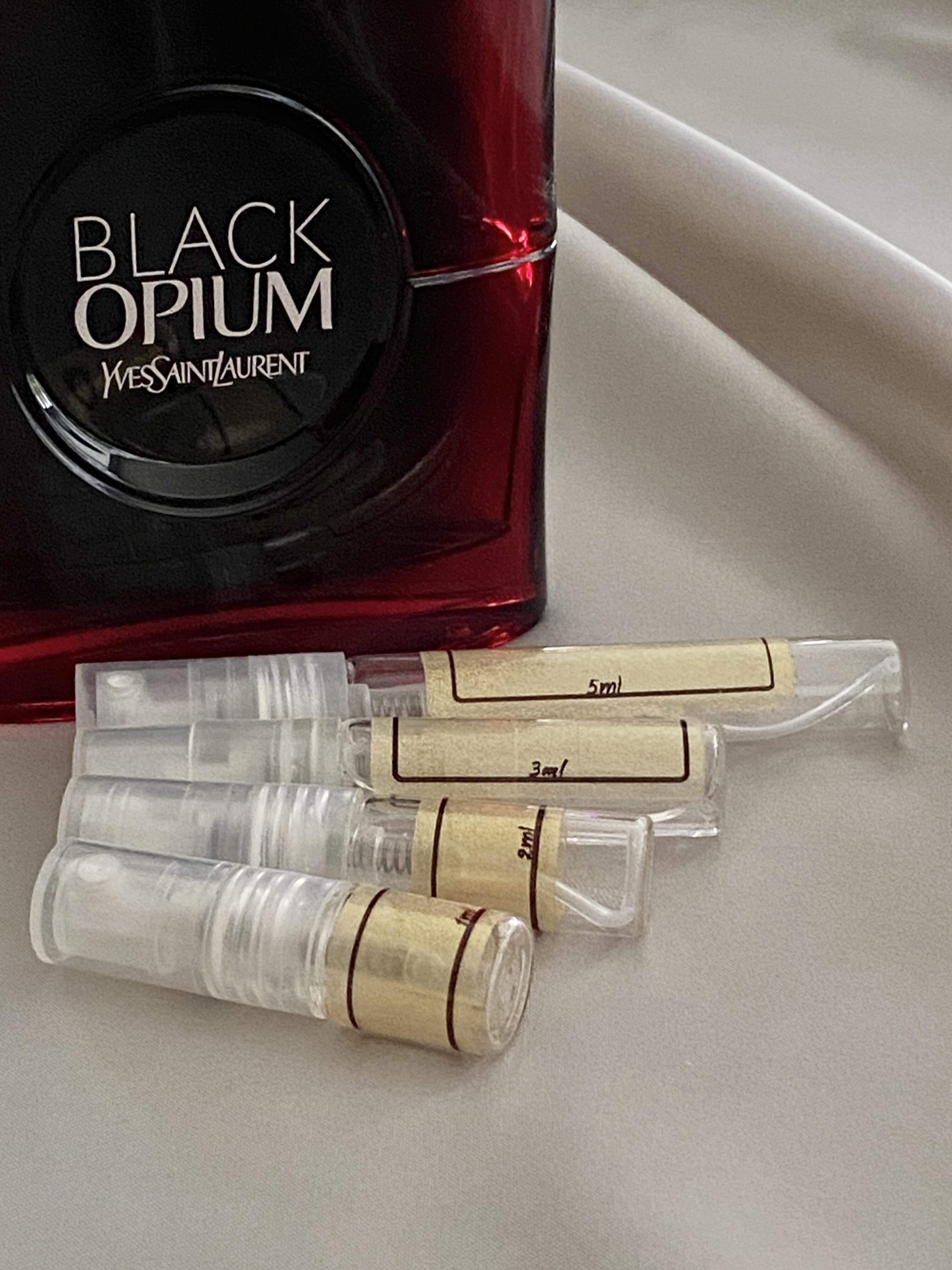 Yves Saint Laurent Black Opium Over Red and sample bottles