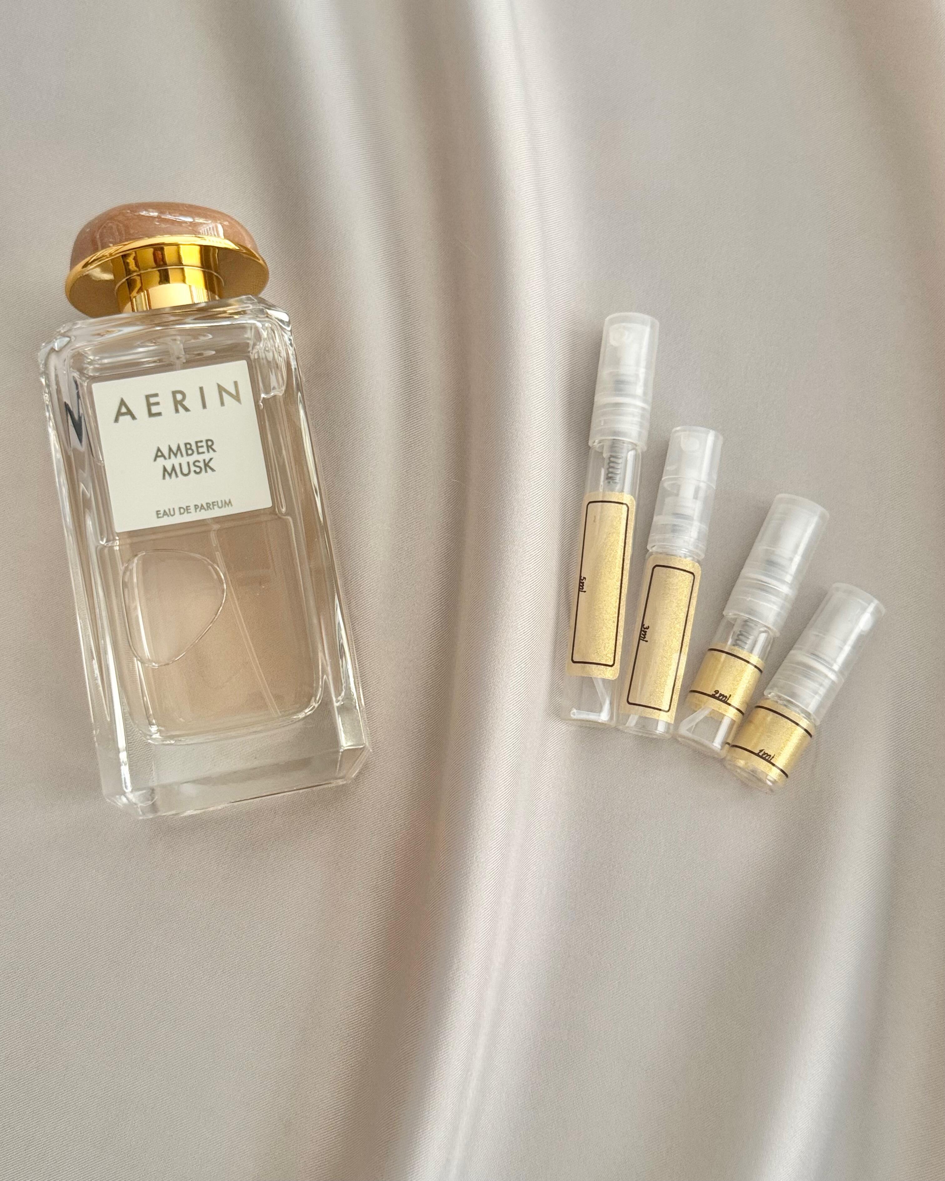 AERIN Amber Musk with sample bottles