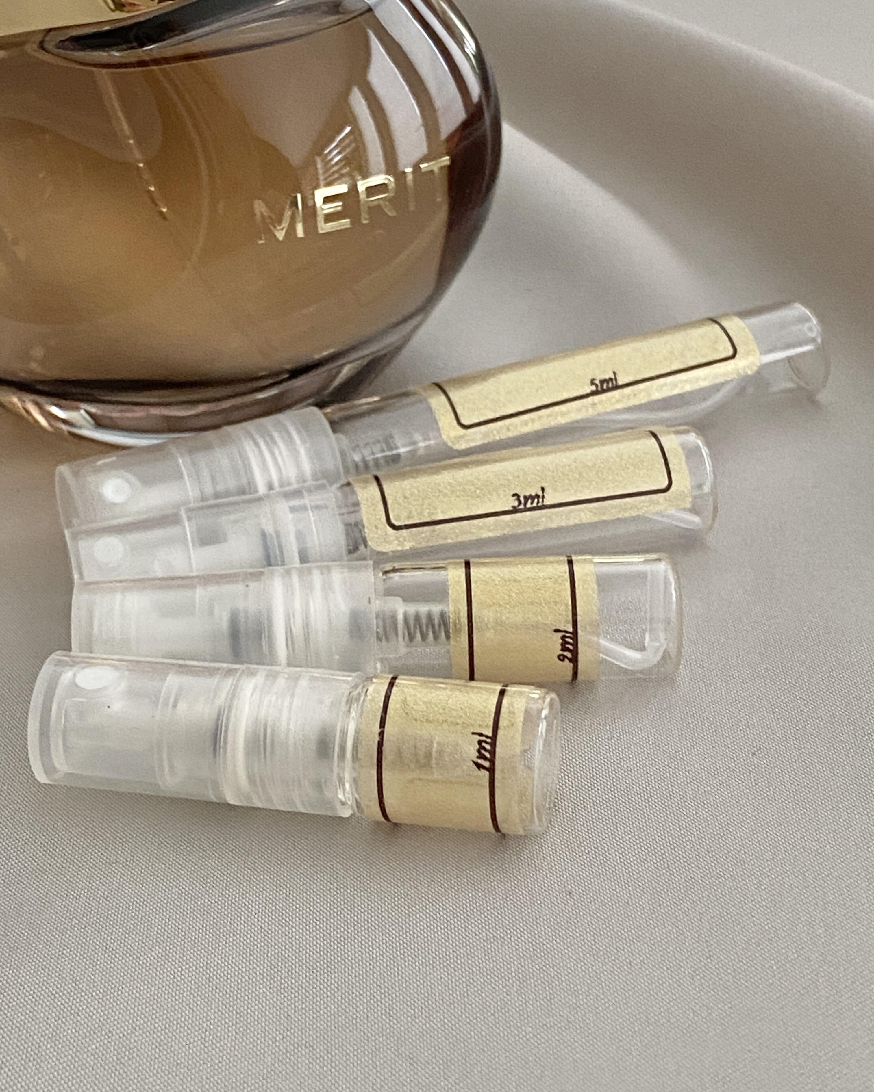 Merit Retrospect perfume and sample bottles