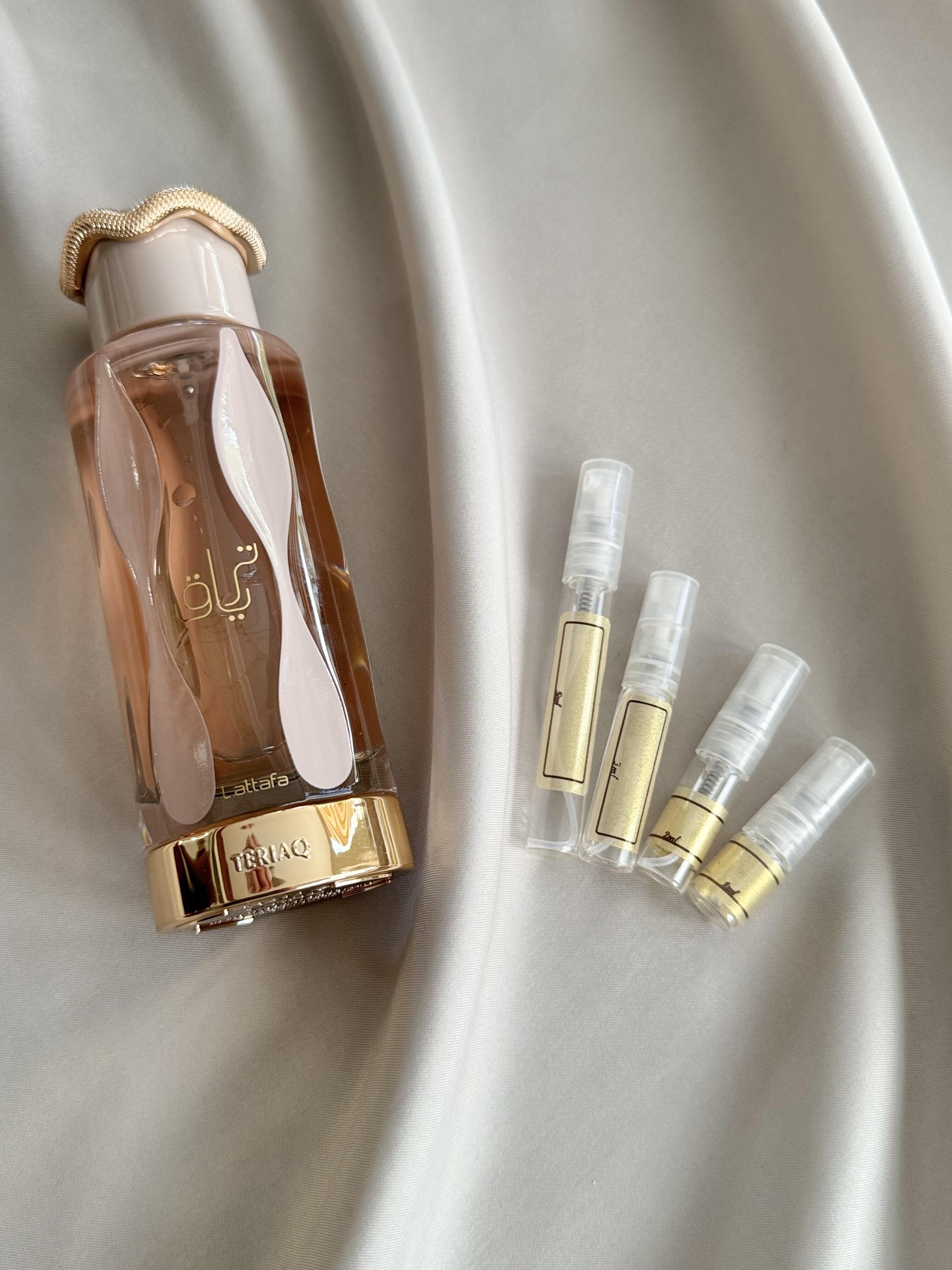 Lattafa Teriaq with sample bottles