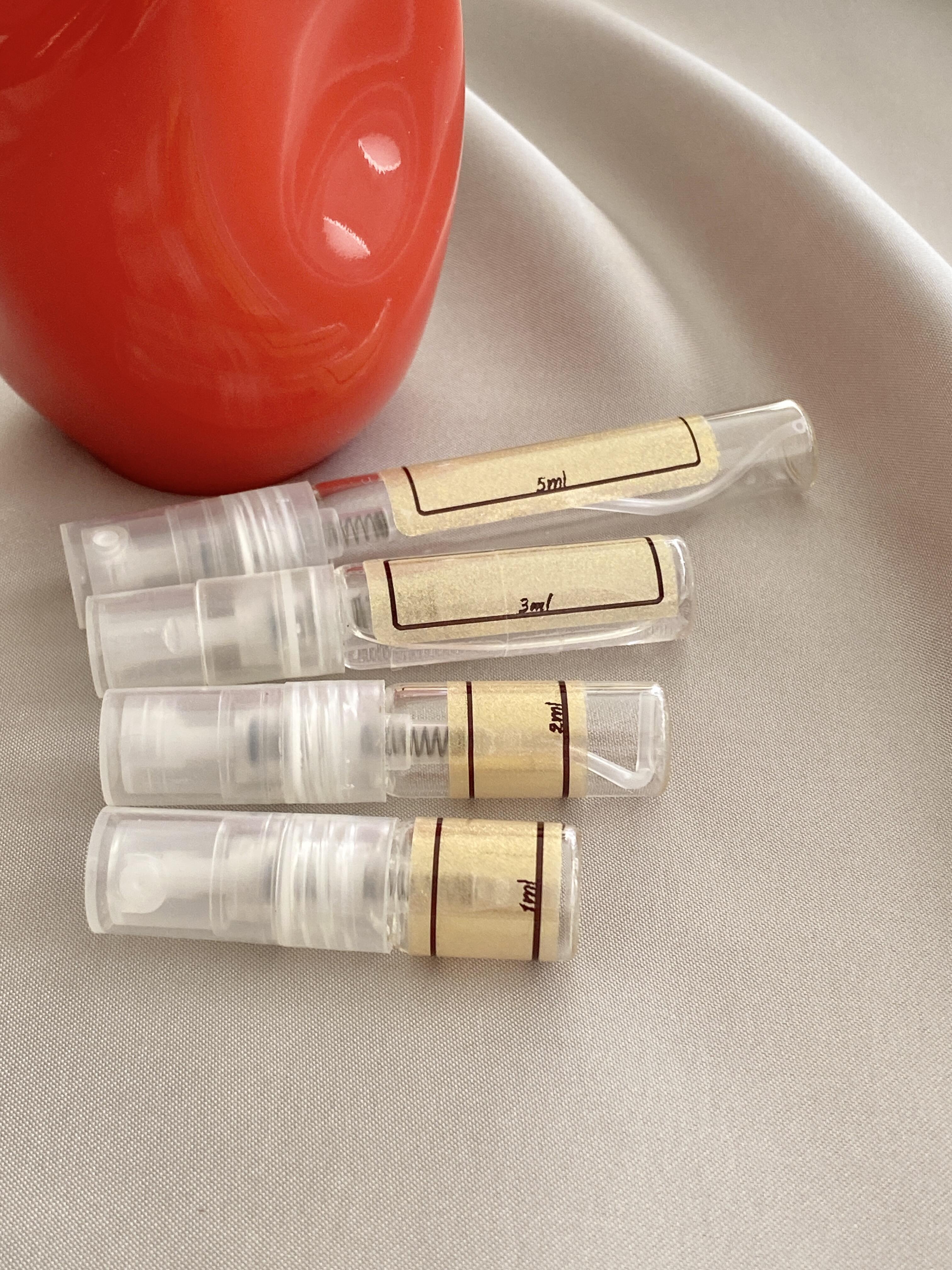 Kylie Jenner Cosmic Intense and sample bottles