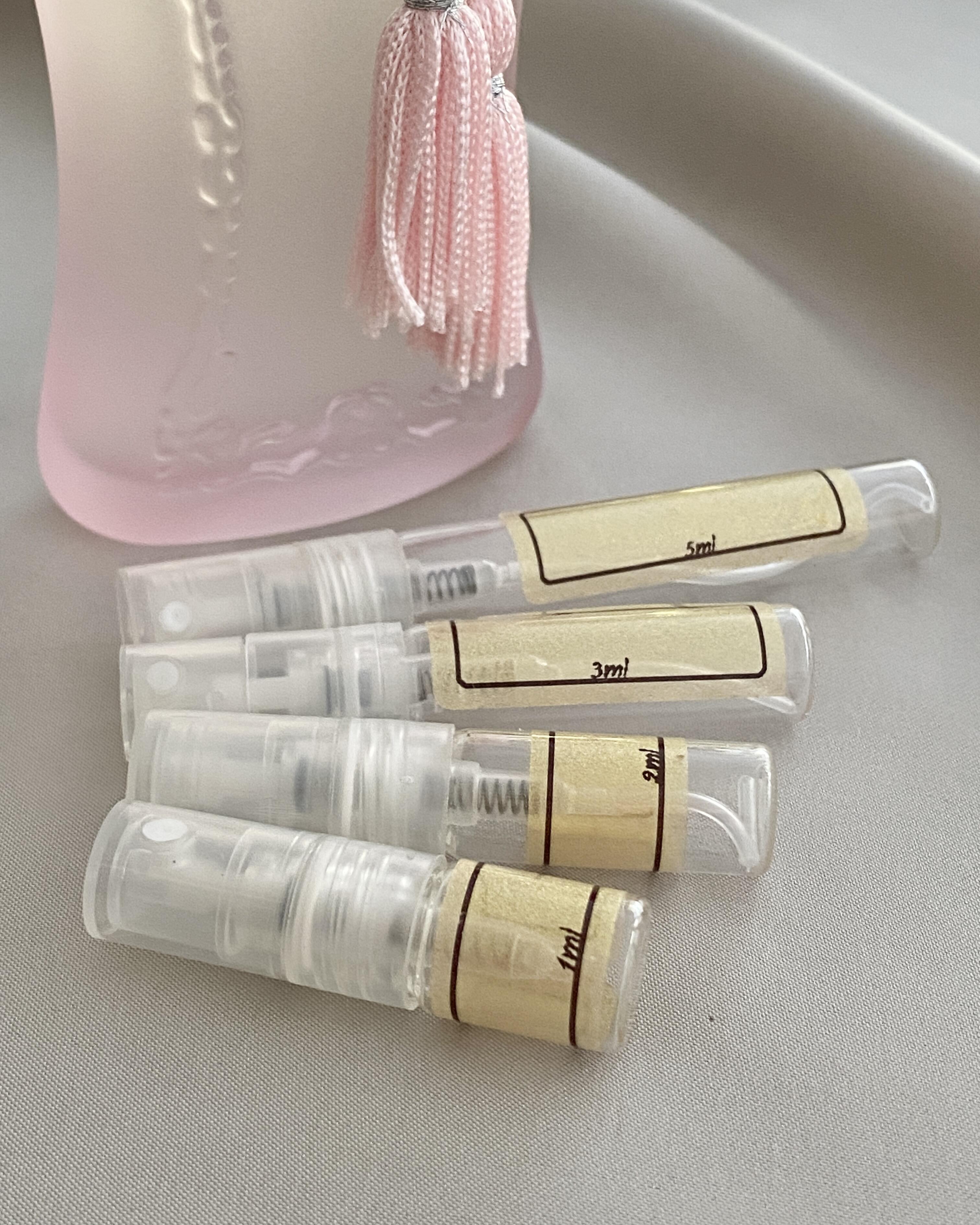 Delina La Rosee and samples bottles