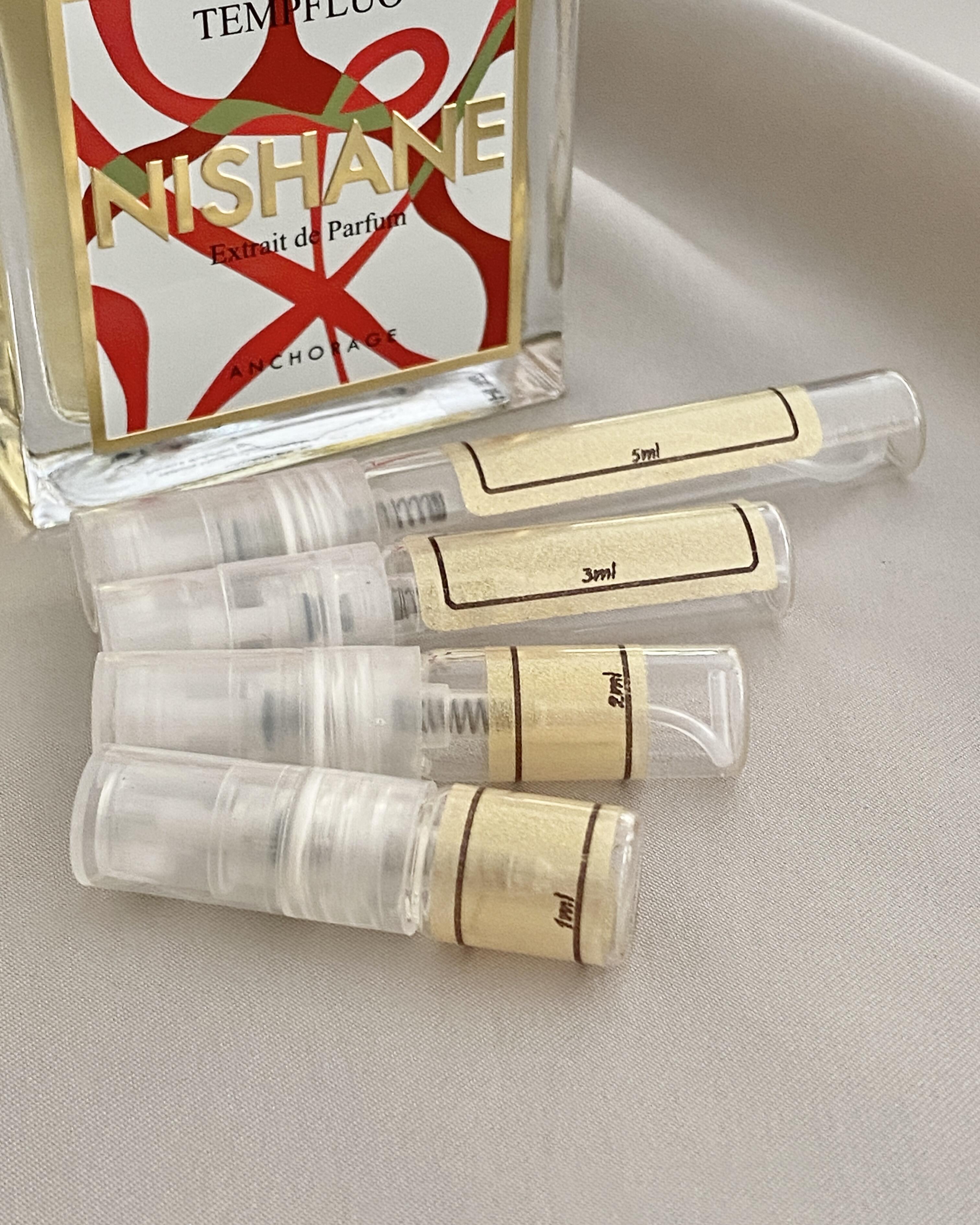 Nishane Tempfluo and sample bottles
