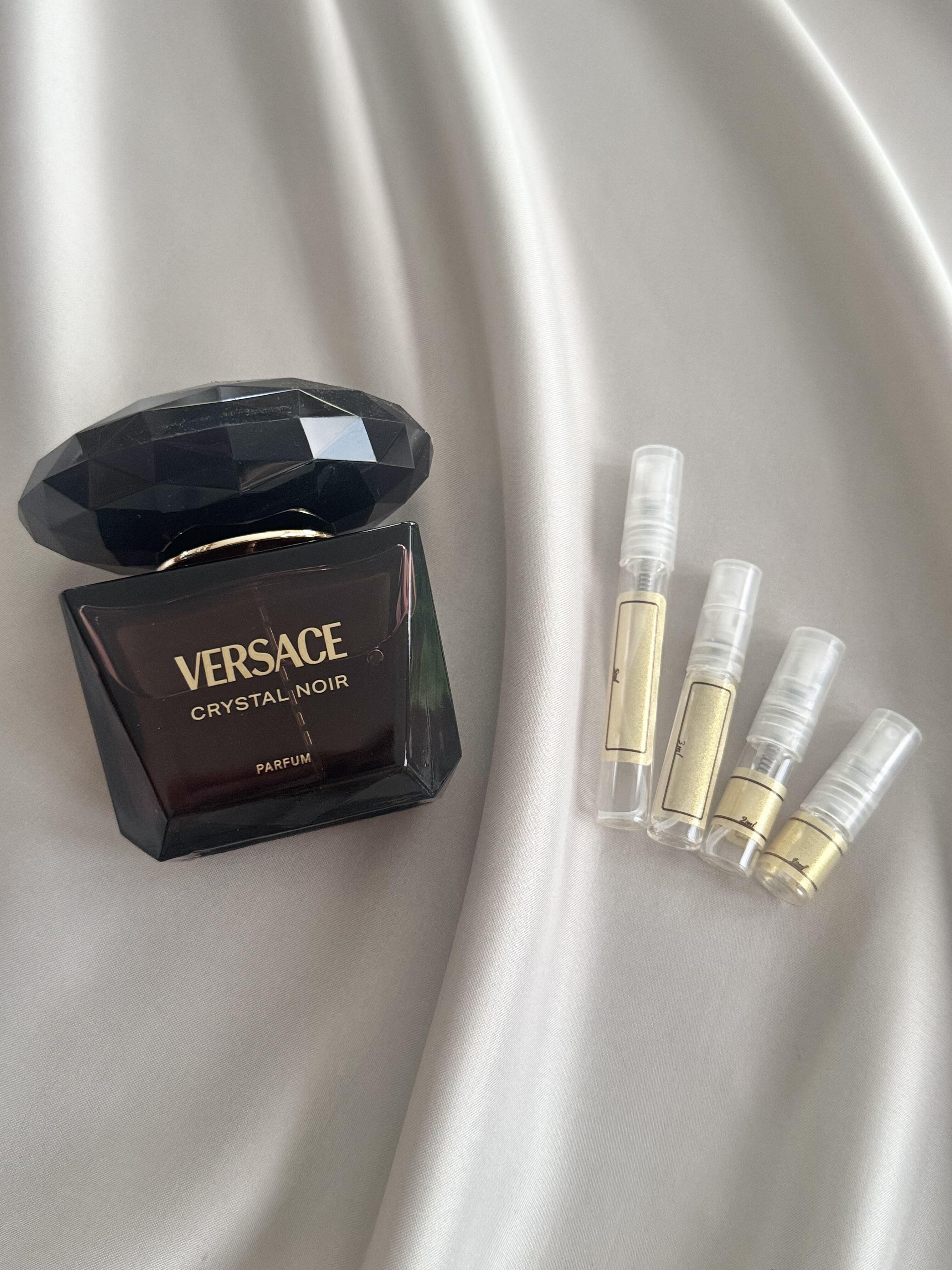 Versace Crystal Noir Parfum with sample bottles