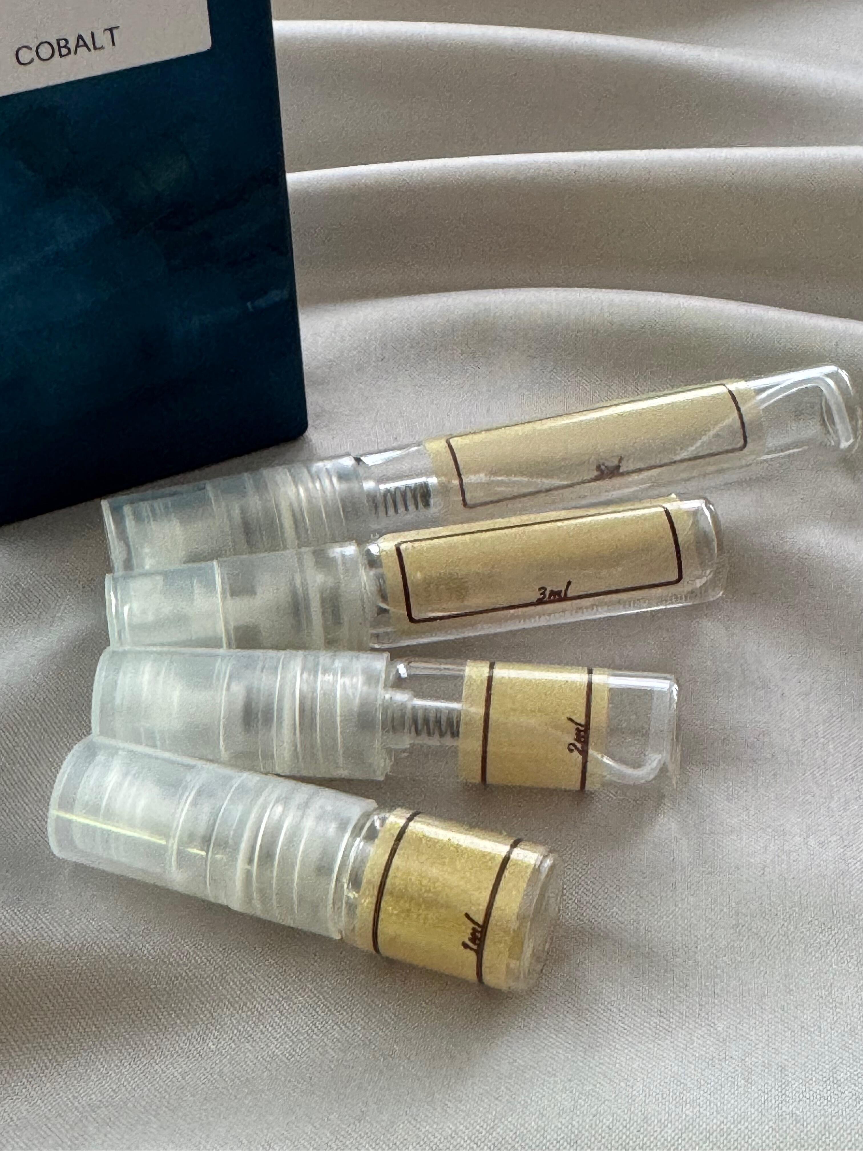 Loewe 7 Cobalt with sample bottles