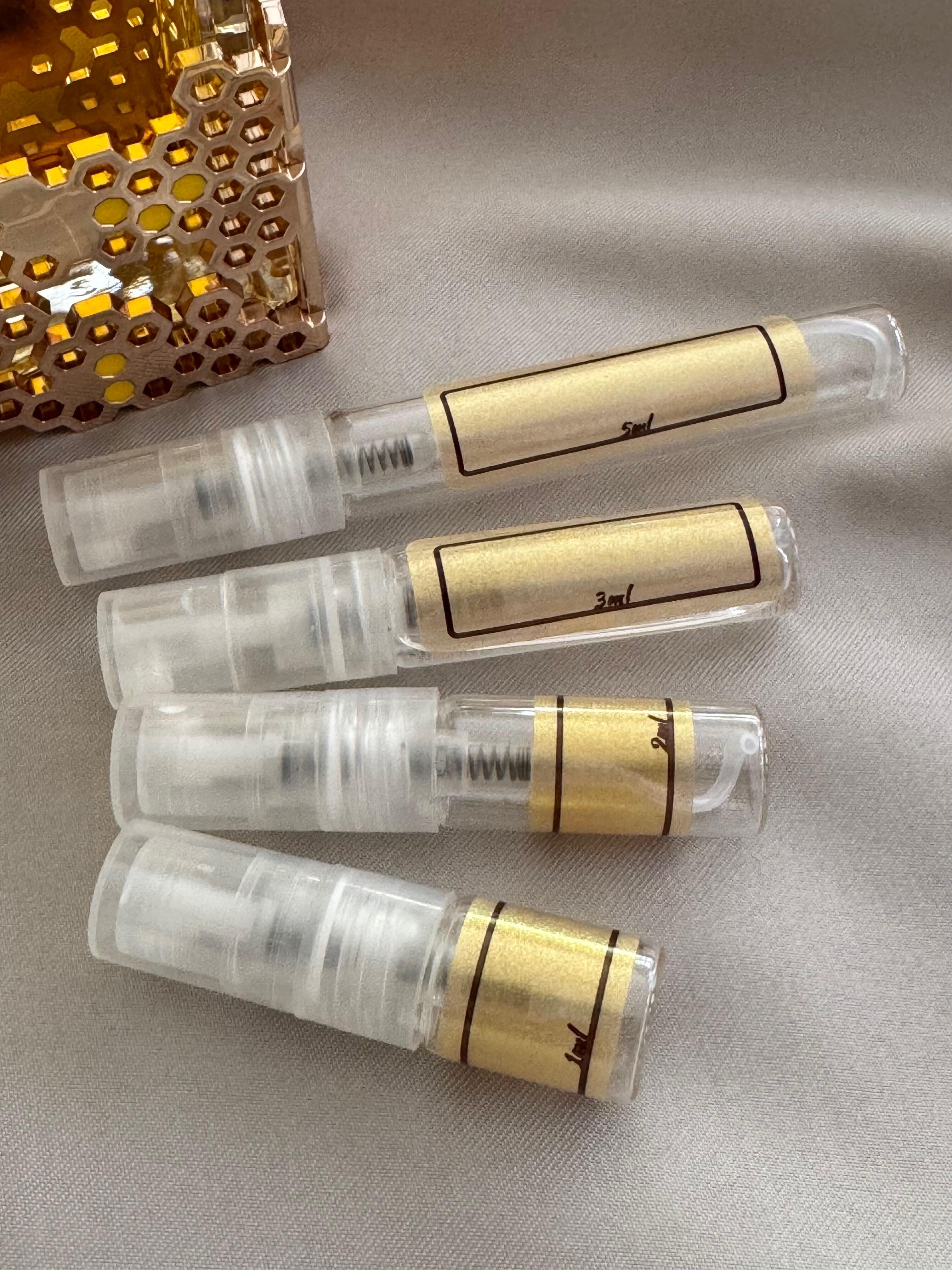 Lattafa Atheeri and sample bottles
