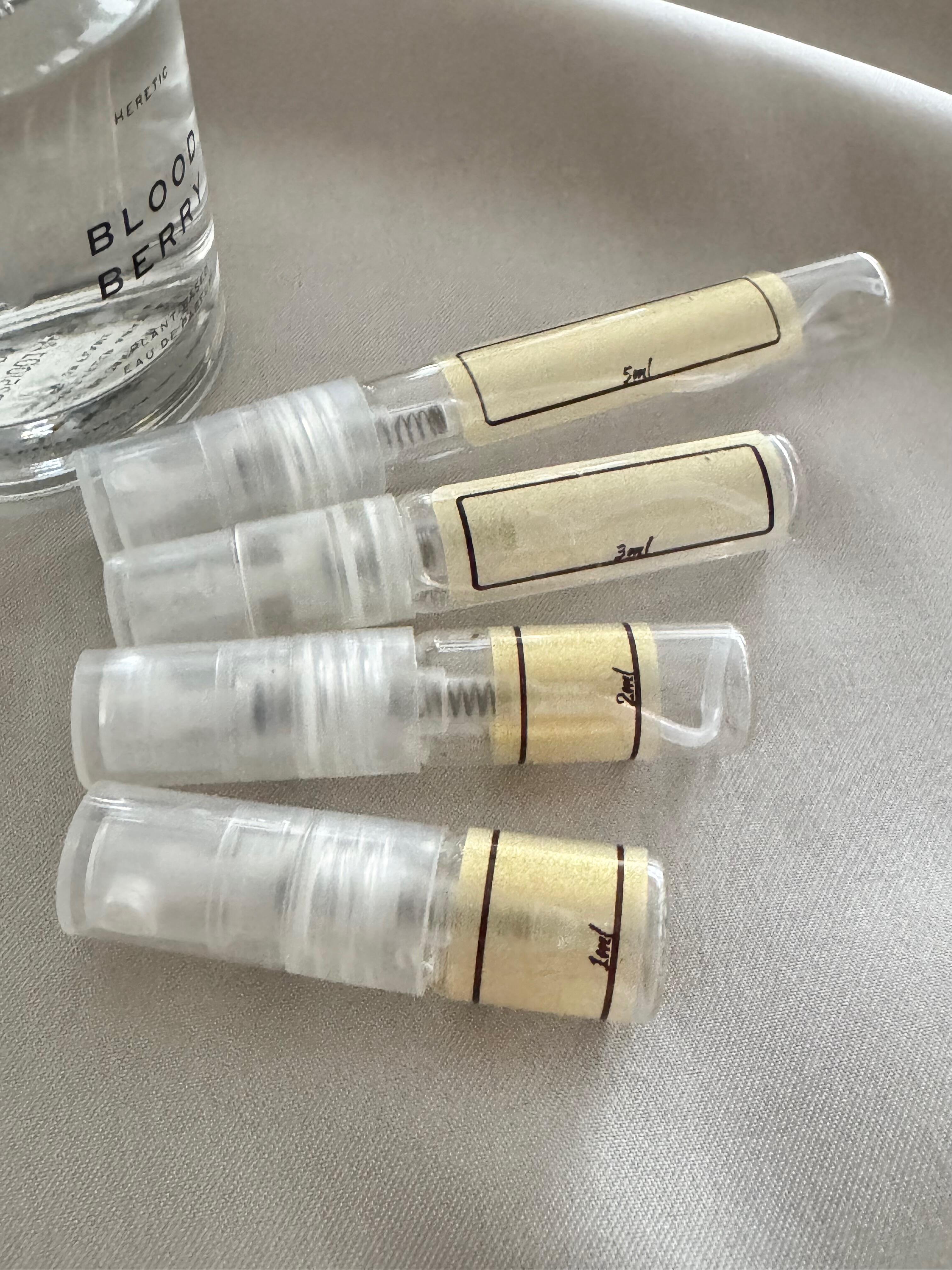 Heretic Blood Berry and sample bottles
