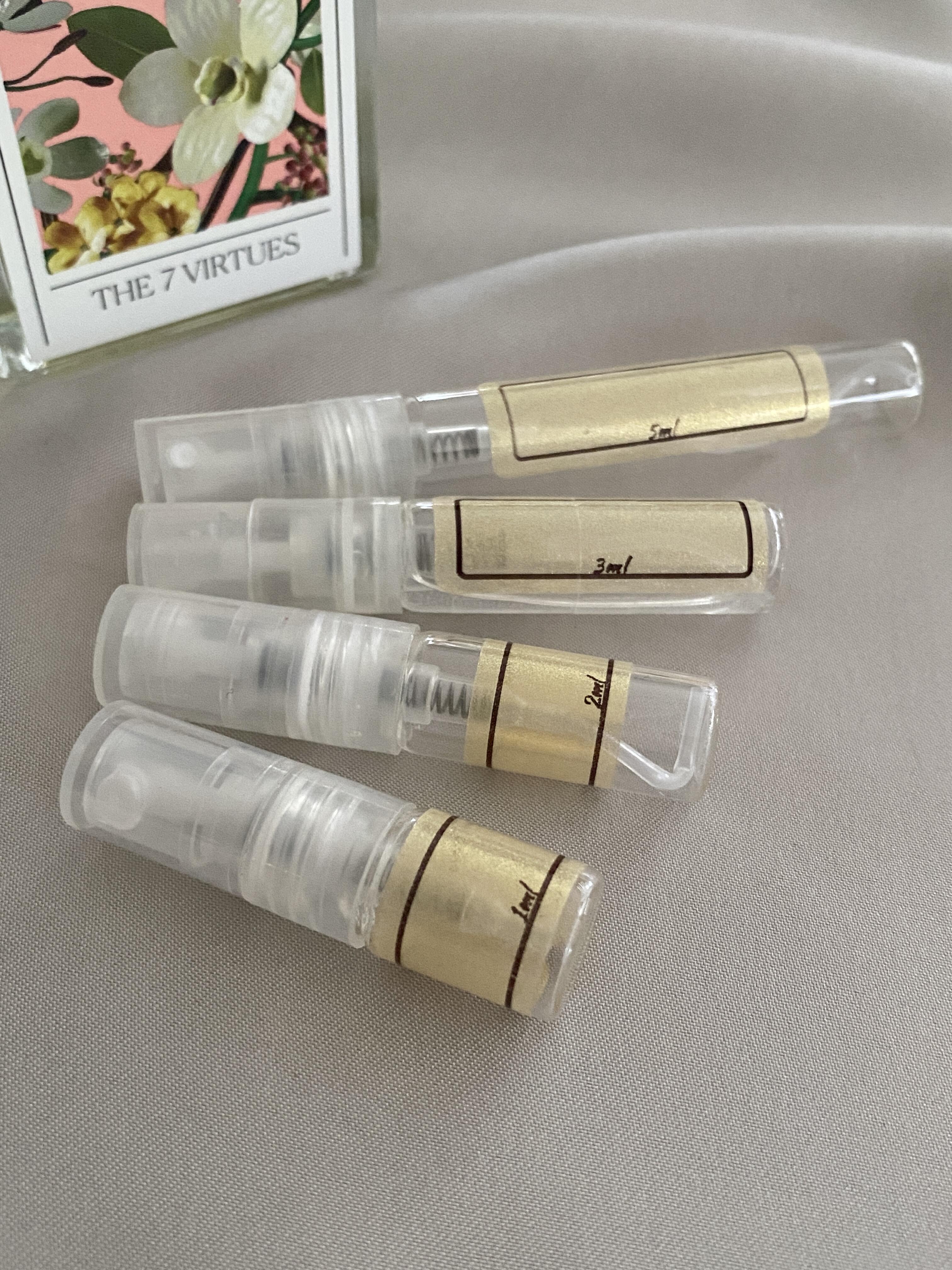 The 7 Virtue Santal Vanille and sample bottles