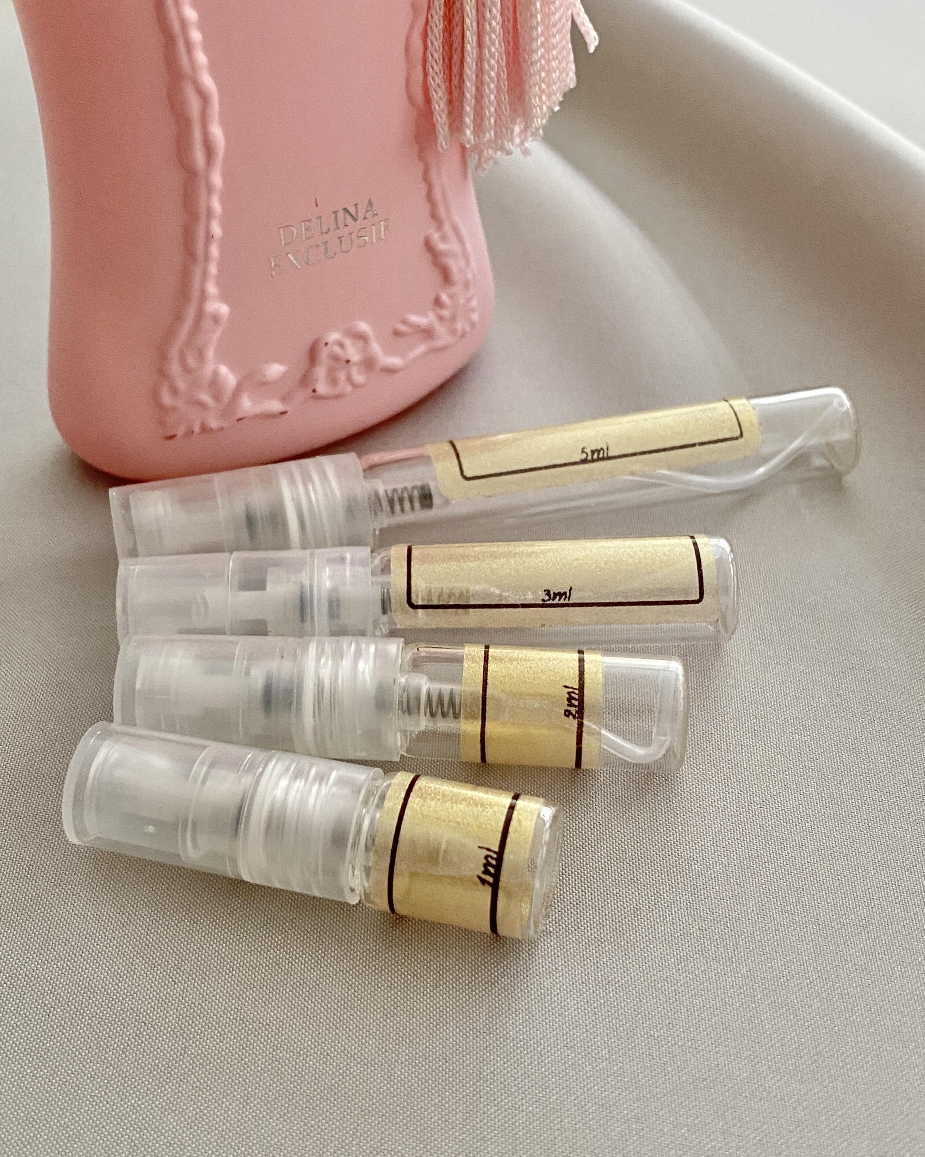 Parfums De Marly Delina Exclusif and sample bottles