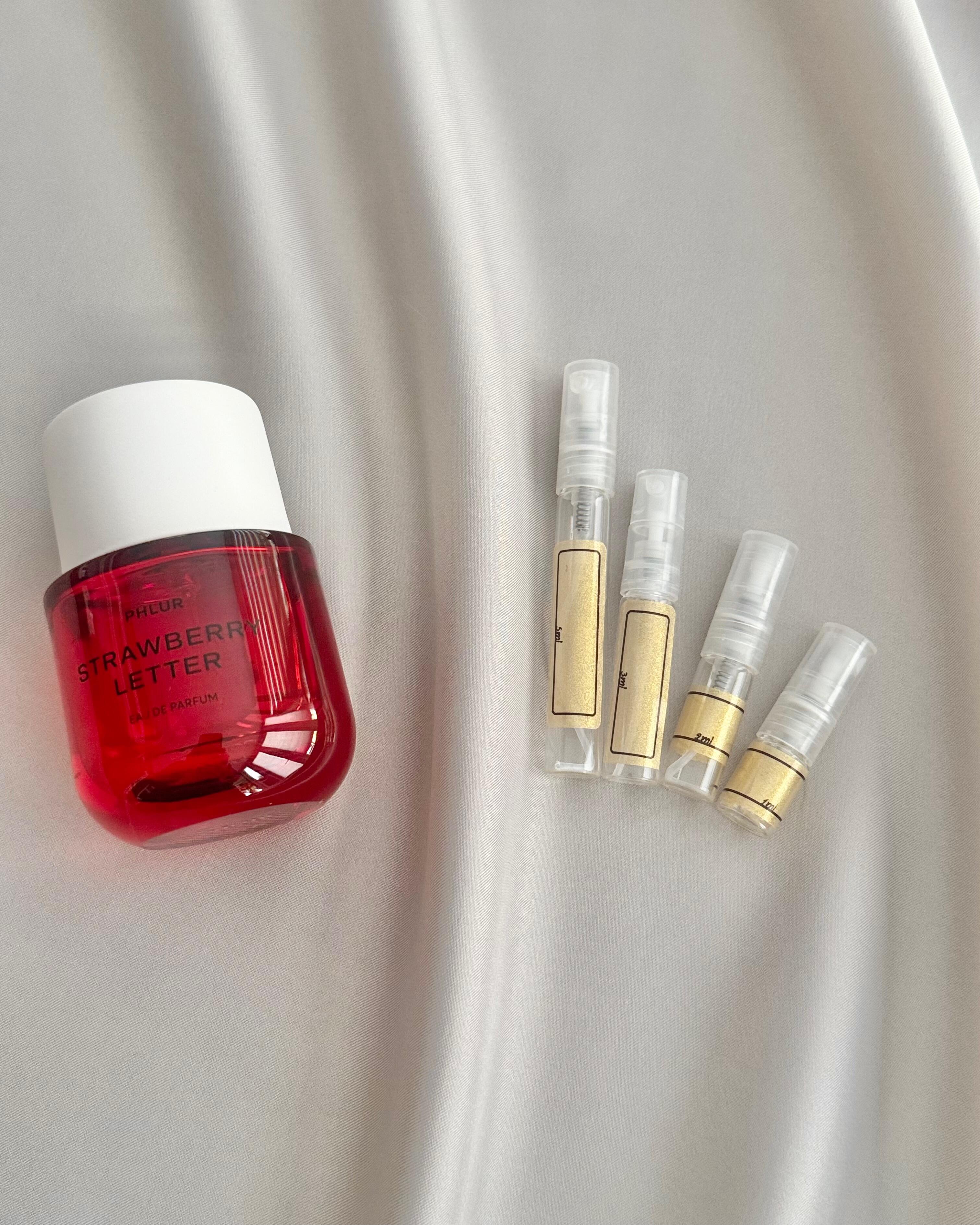 Phlur strawberry Letter with sample bottles