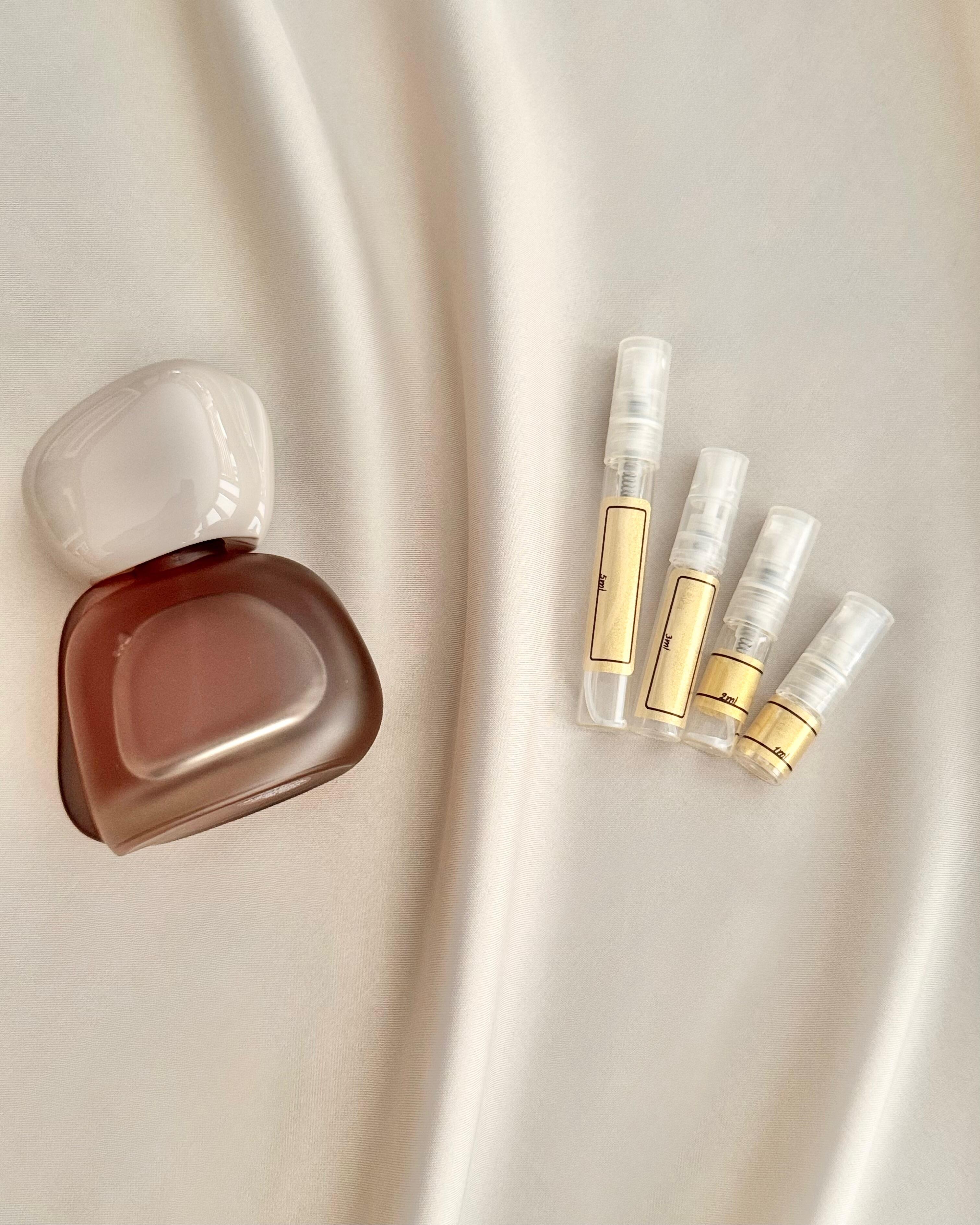 Kylie Jenner Cashmere Muse with sample bottles