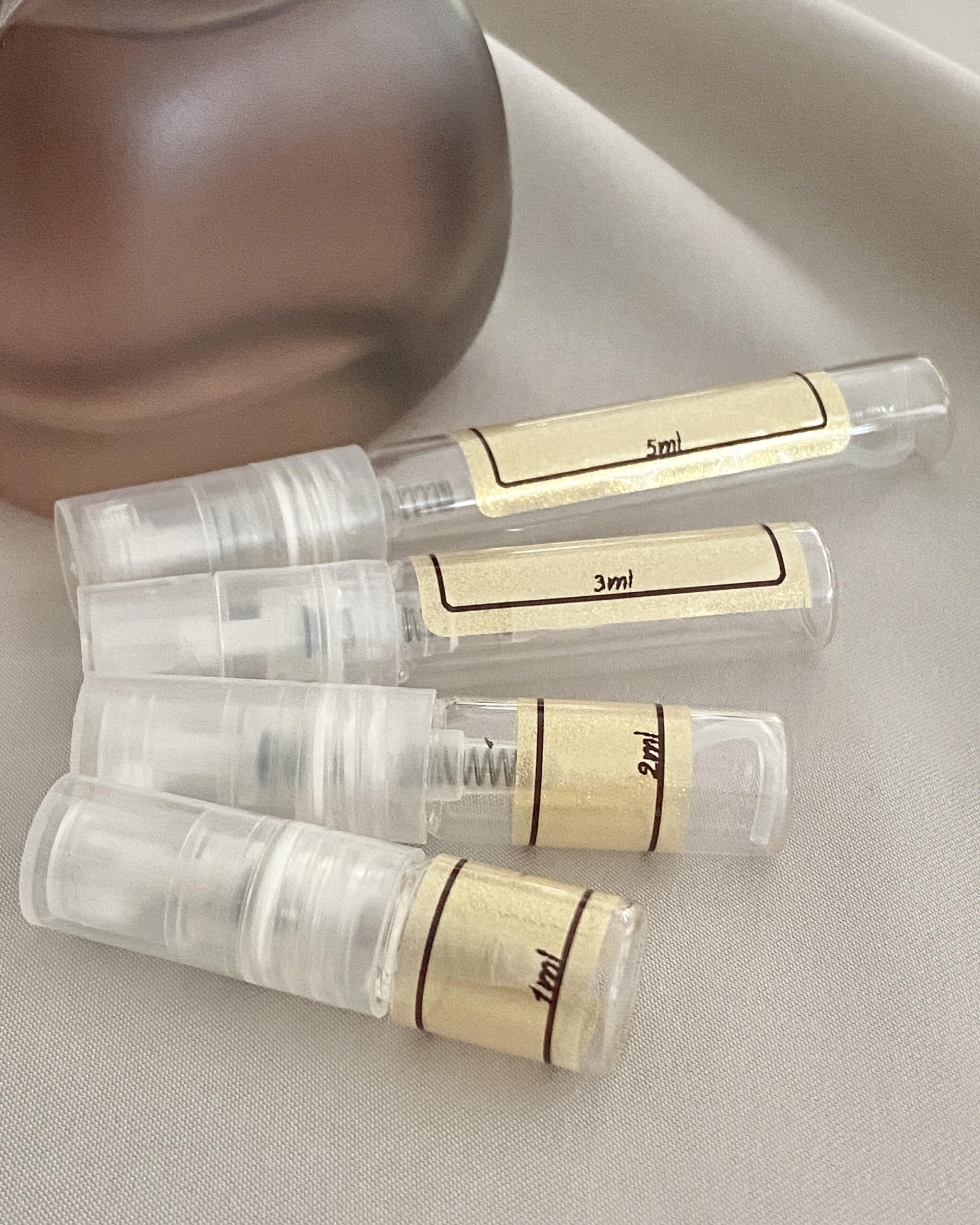 Kylie Jenner Cashmere Muse and sample bottles