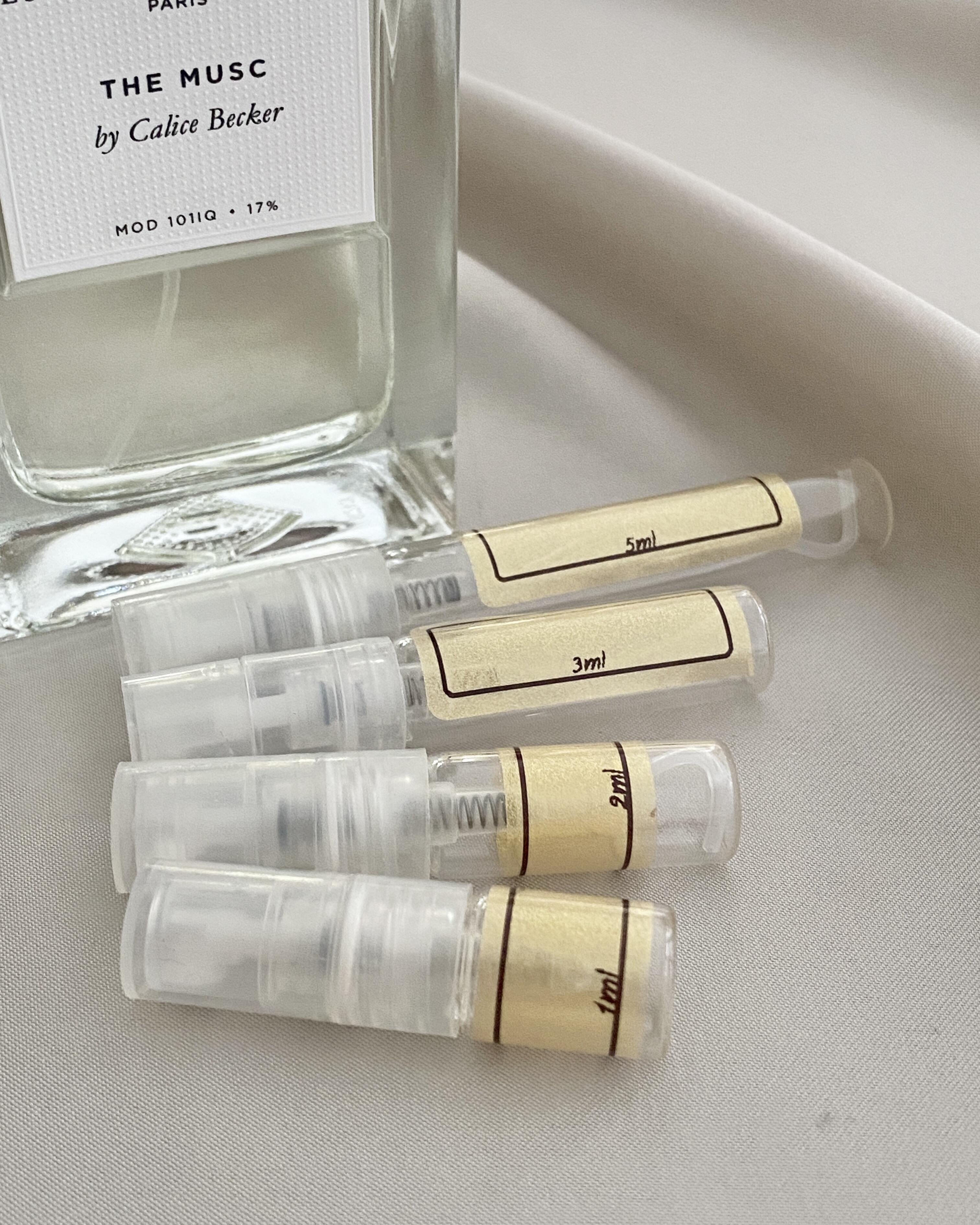 Essenital Parfums The Musc and sample bottles