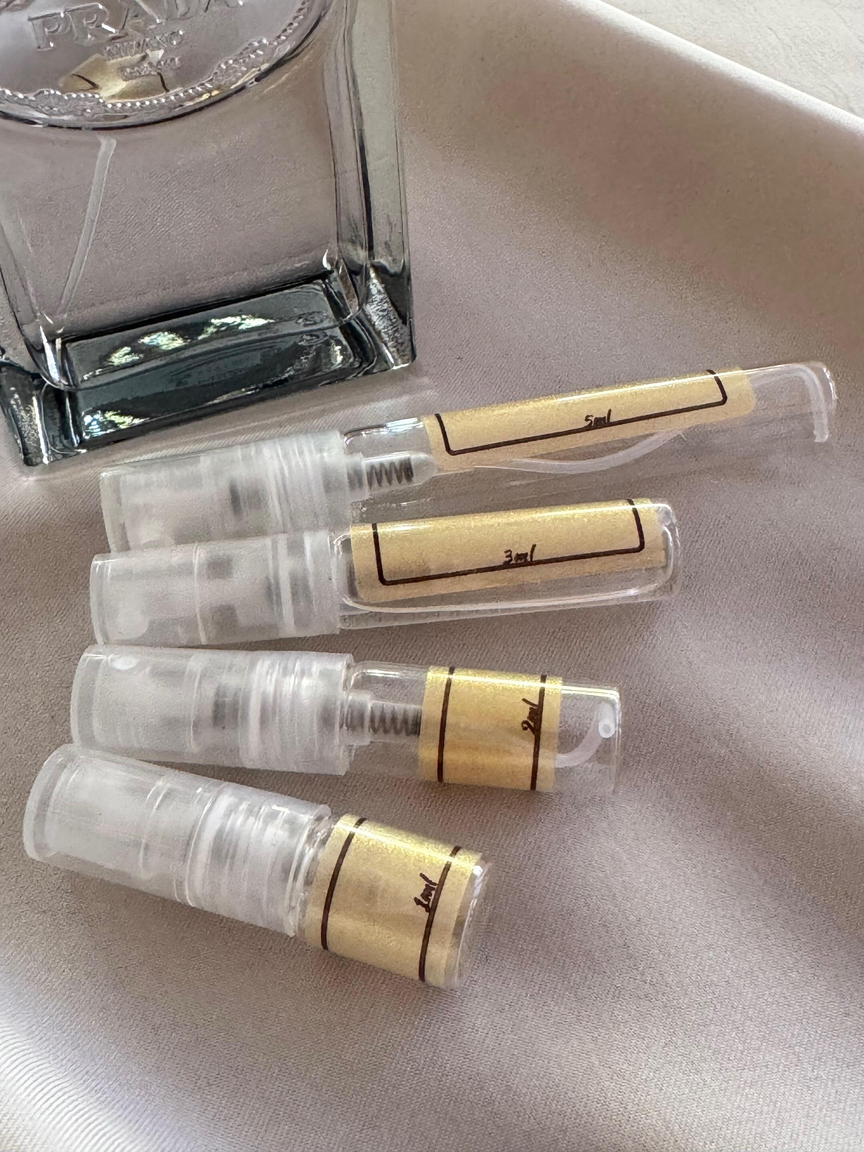 Prada Infusion de Cedre and sample bottles