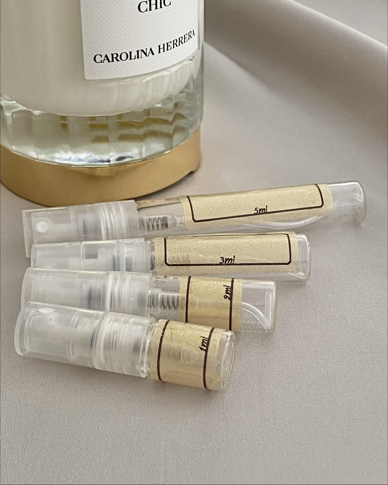 Carolina Herrera Cedar Chic and sample bottles