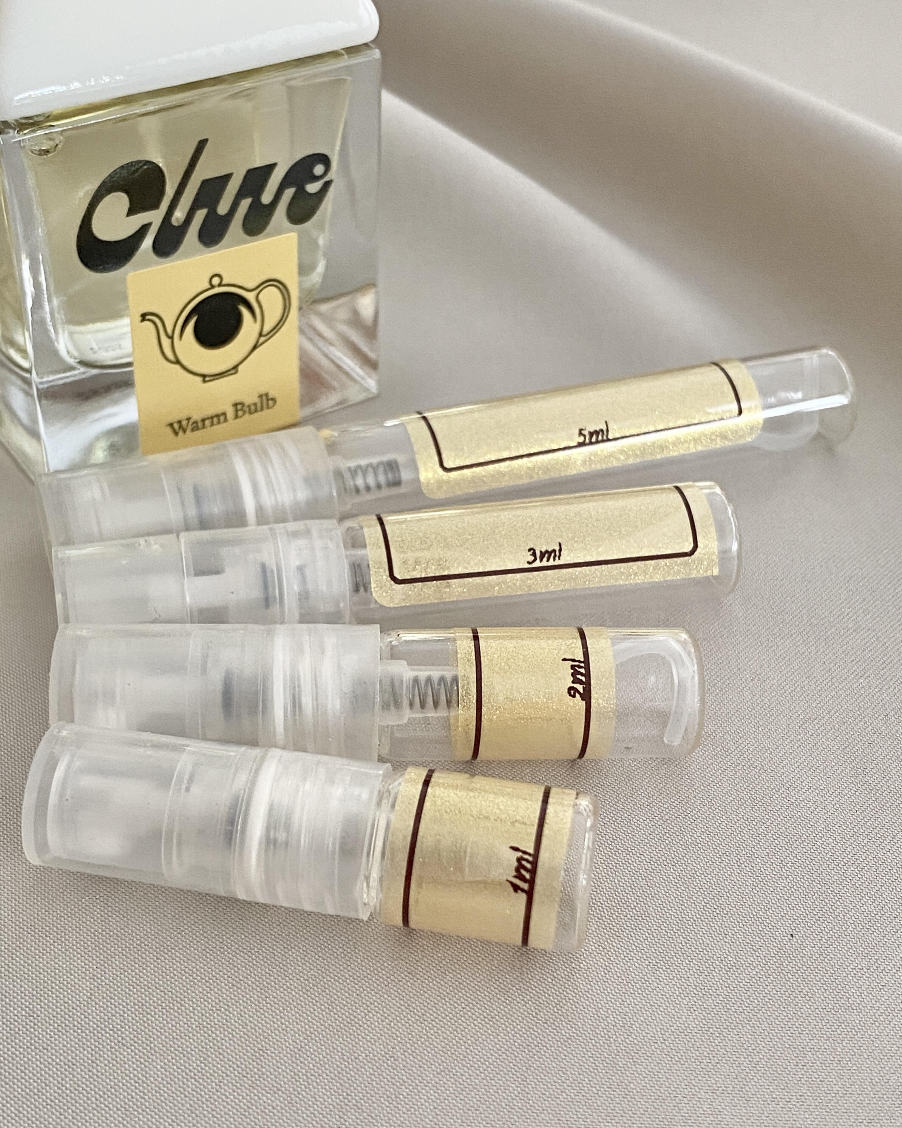 Clue Perfumery Warm Bulb and sample bottles