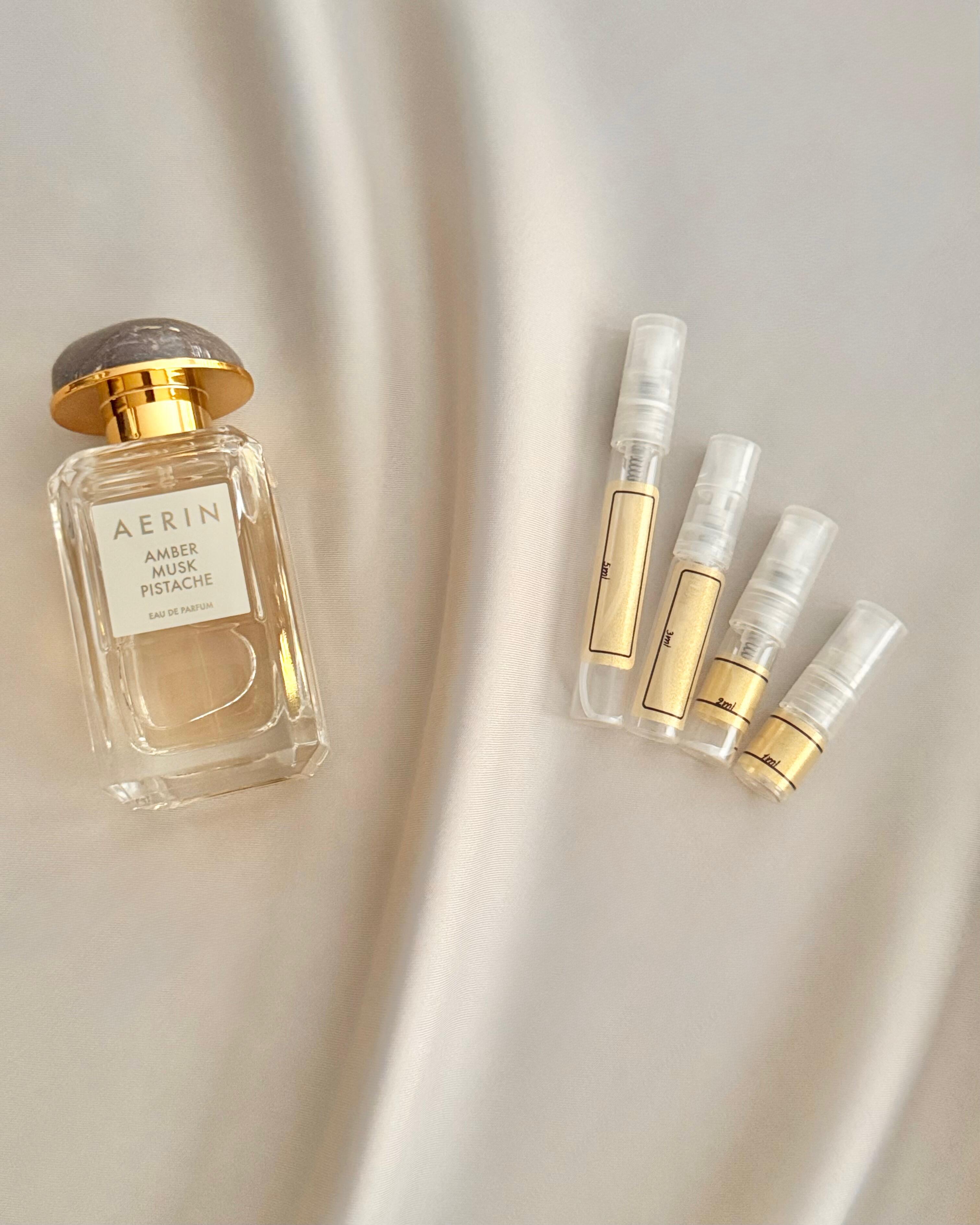AERIN Amber Musk Pistache with sample bottles