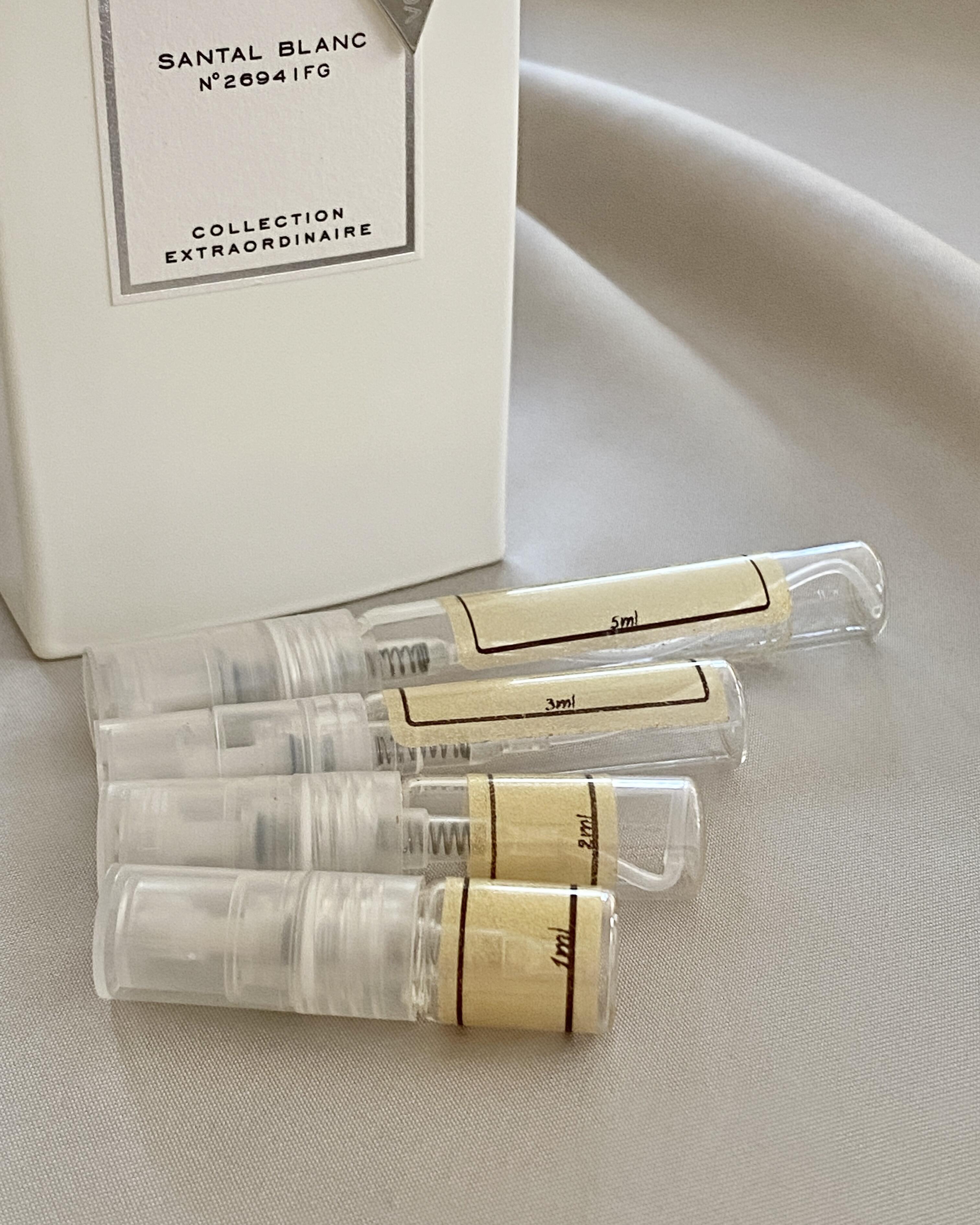 Van Cleef & Arpels Santal Blanc and sample bottles