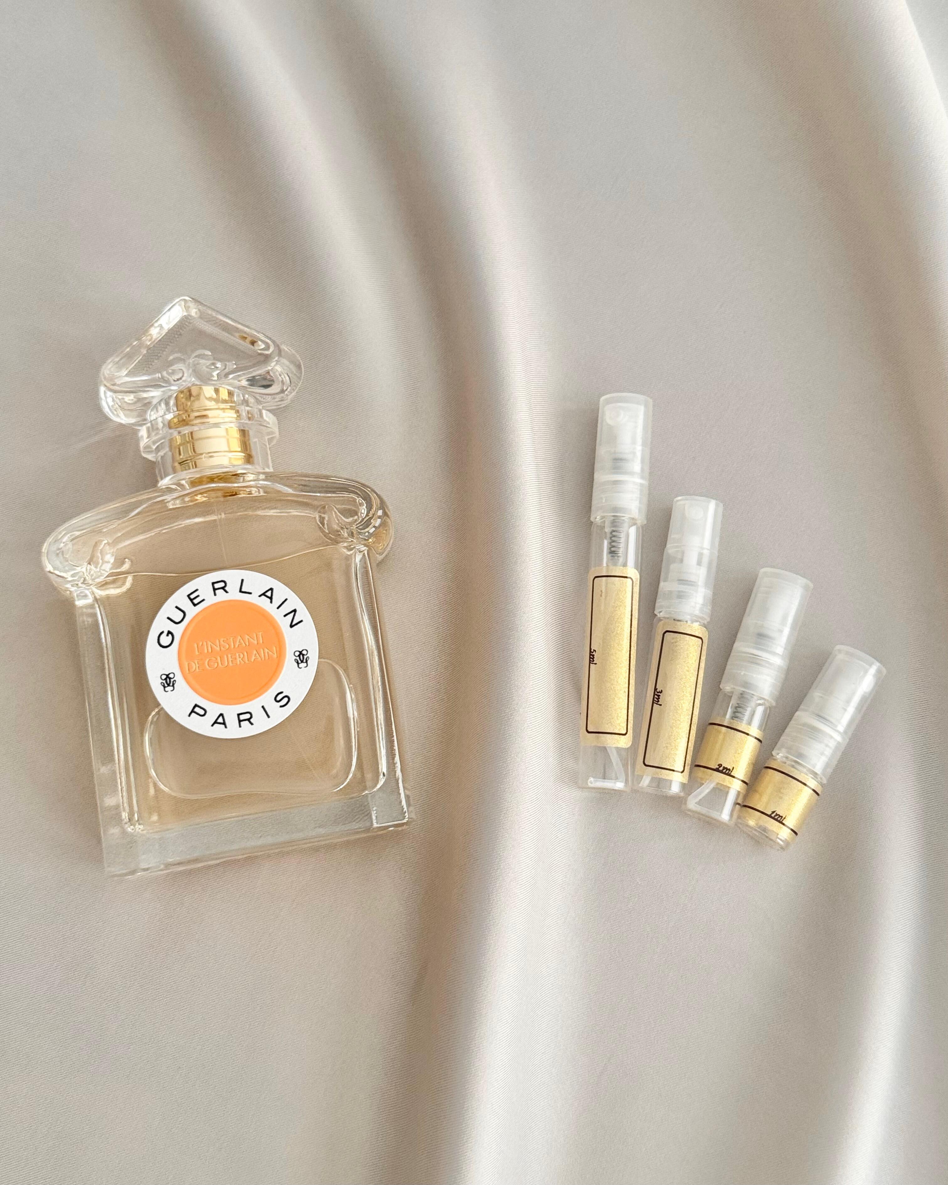 Guerlain L'Instant de Guerlain with sample bottles