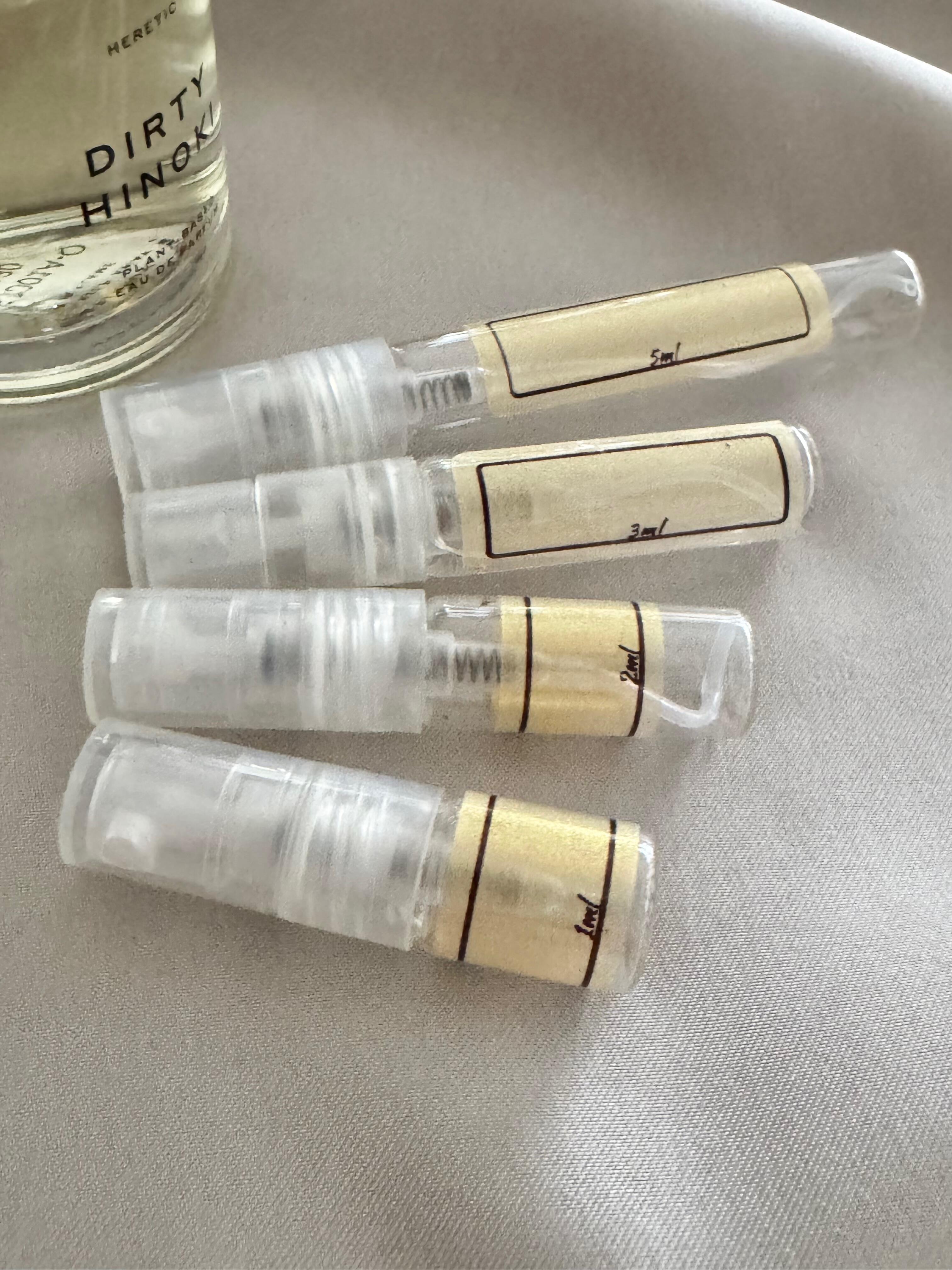 Heretic Dirty Hinoki with sample bottles