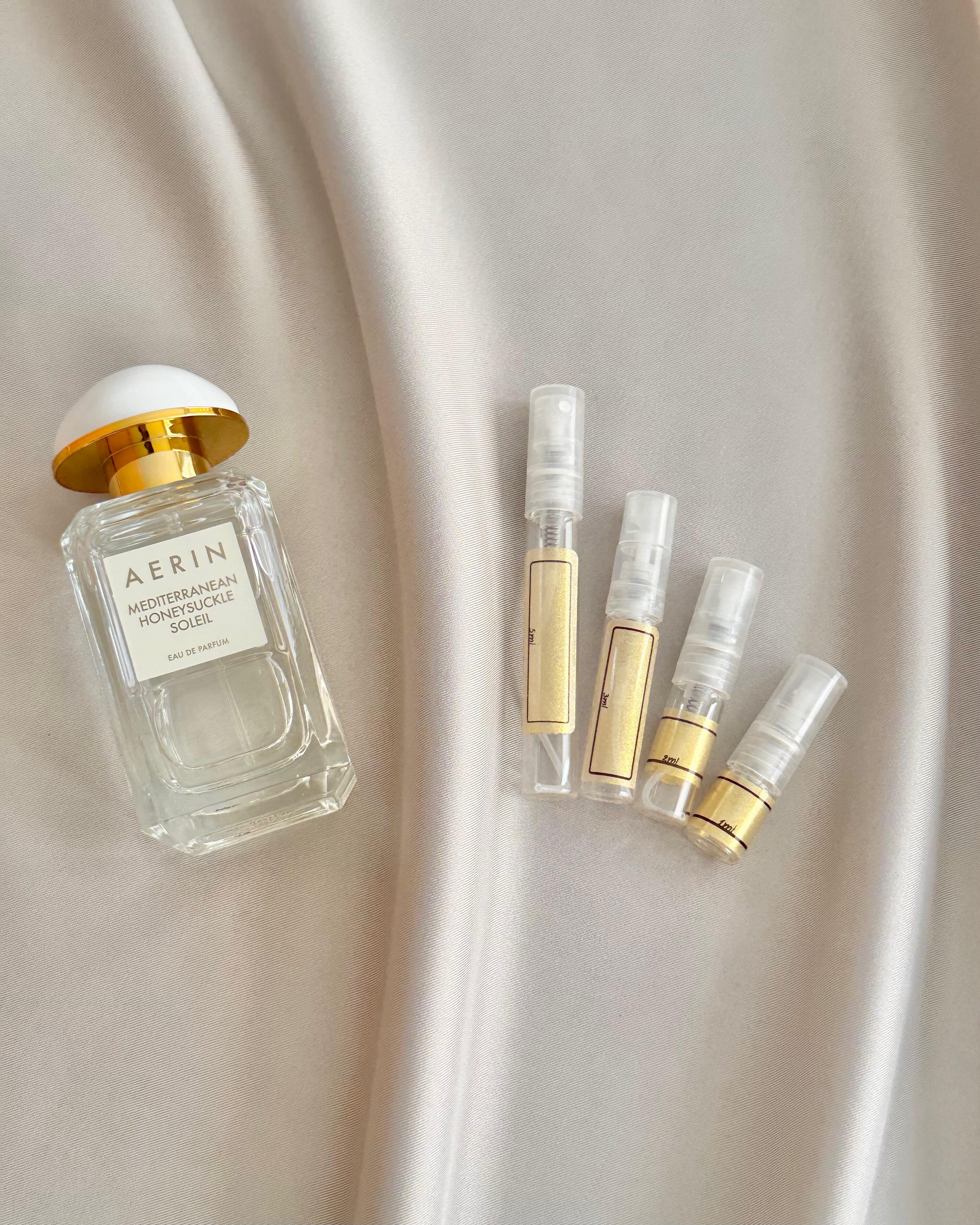 AERIN Mediterranean Honeysuckle Soleil with sample bottles