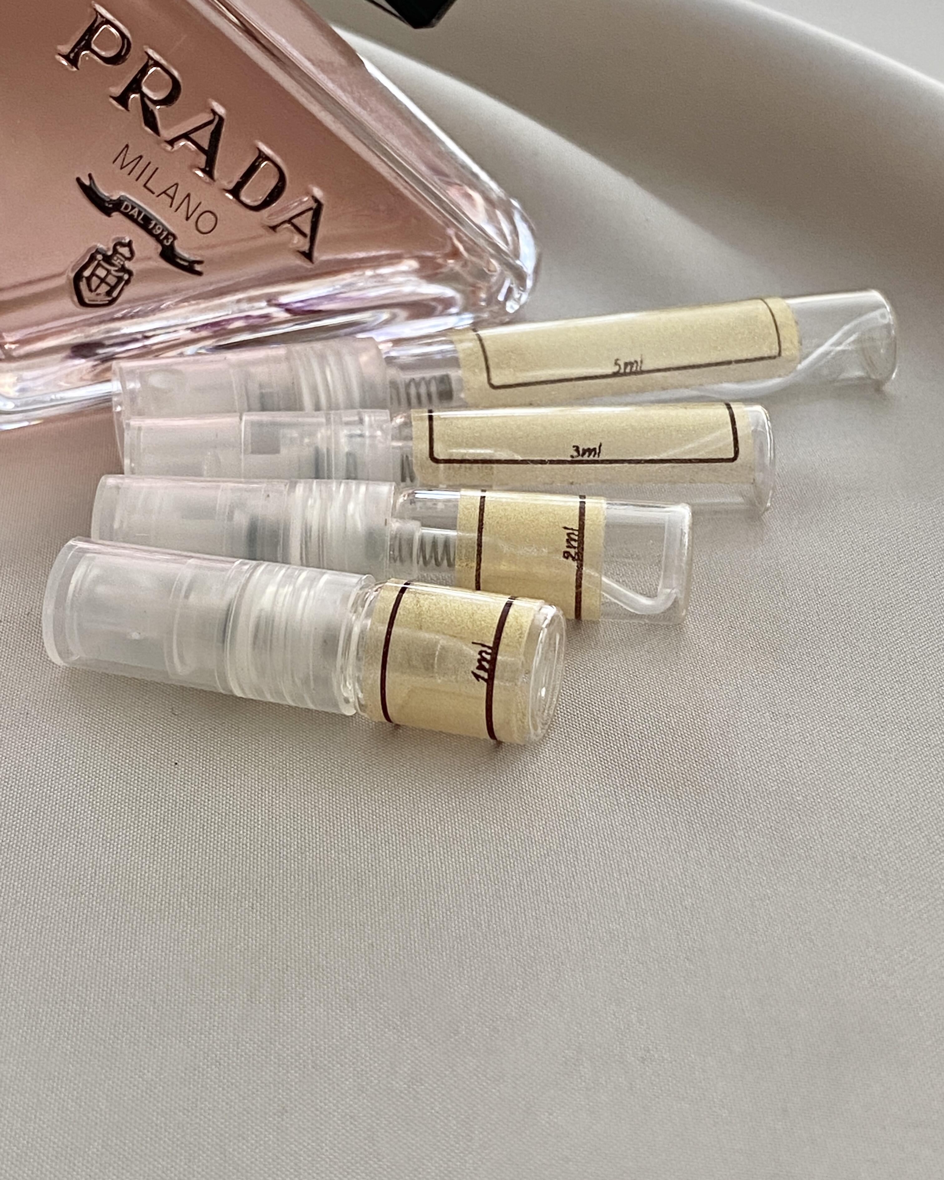 Prada Paradoxe perfume bottle and sample bottles