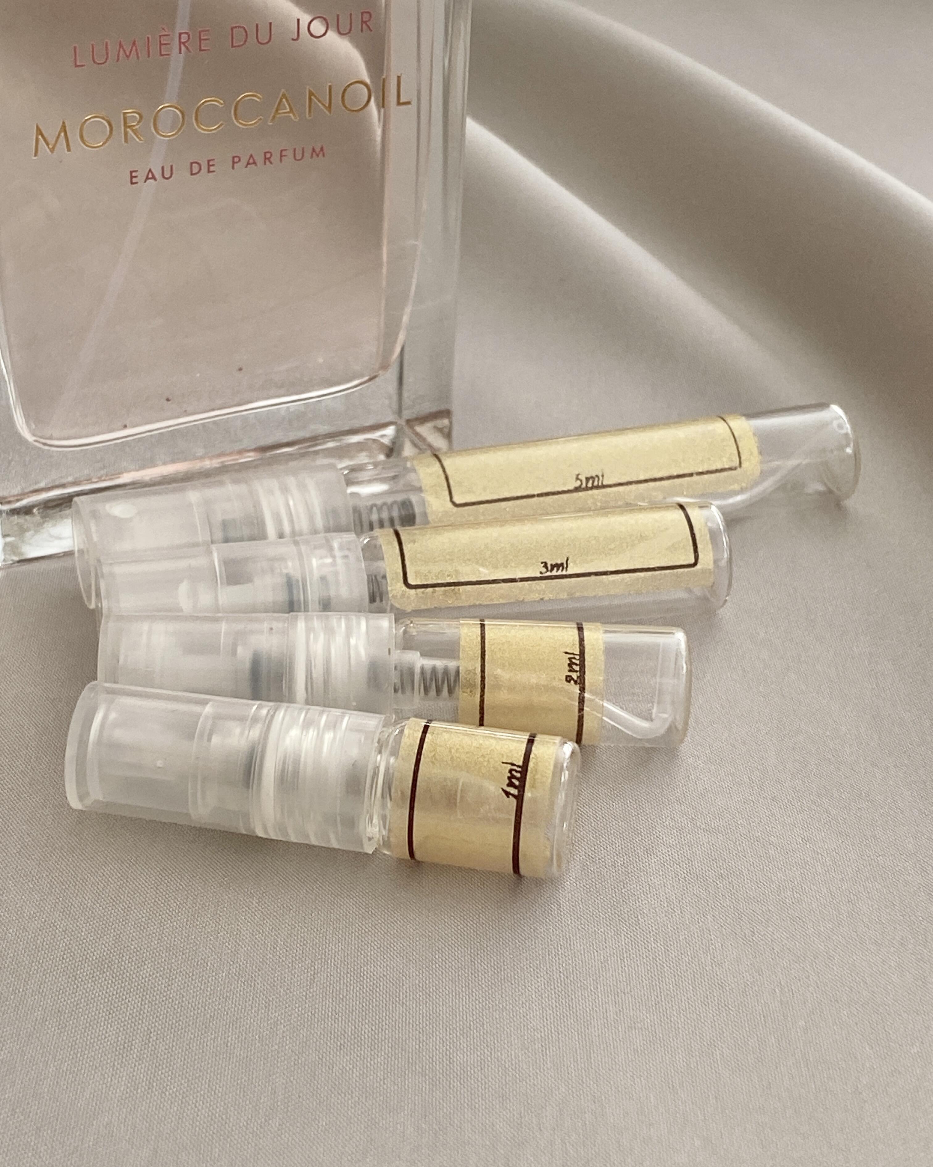 Moroccanoil Lumiere du Jour and sample bottles