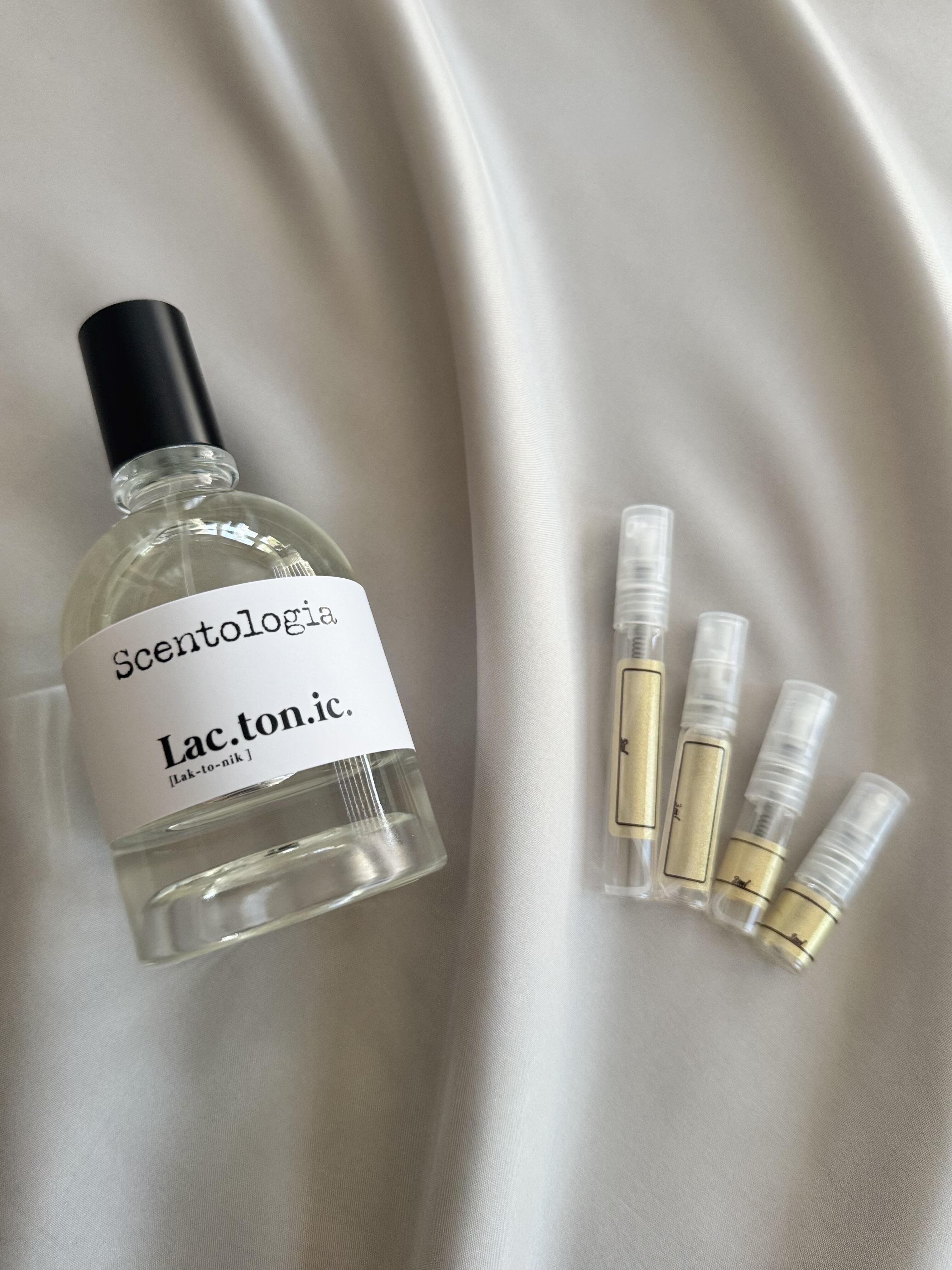 Scentologia Lac.ton.ic with sample bottles
