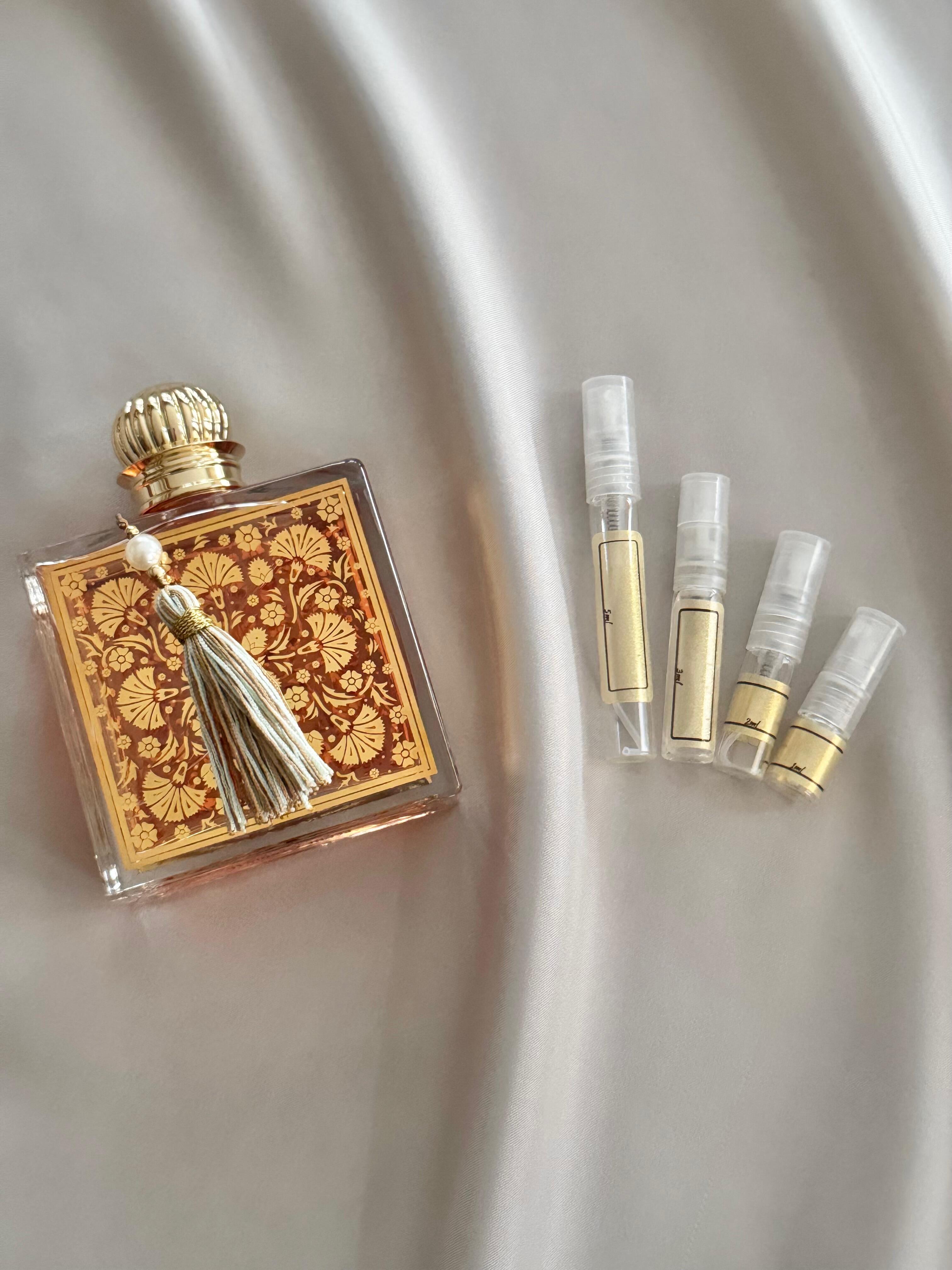 Parfums MDCI Peche Cardinal with sample bottles