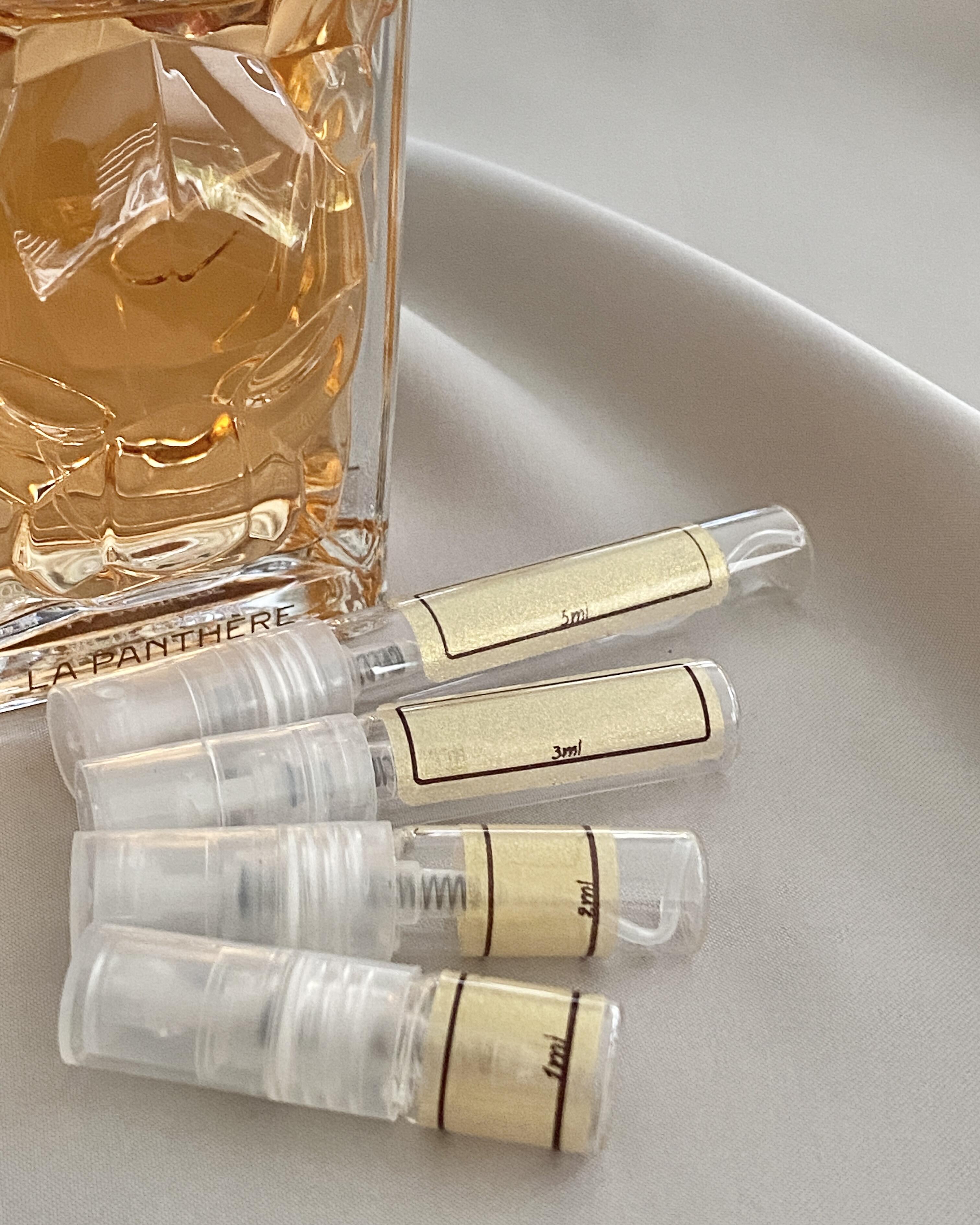 Cartier La Panthere with sample bottles
