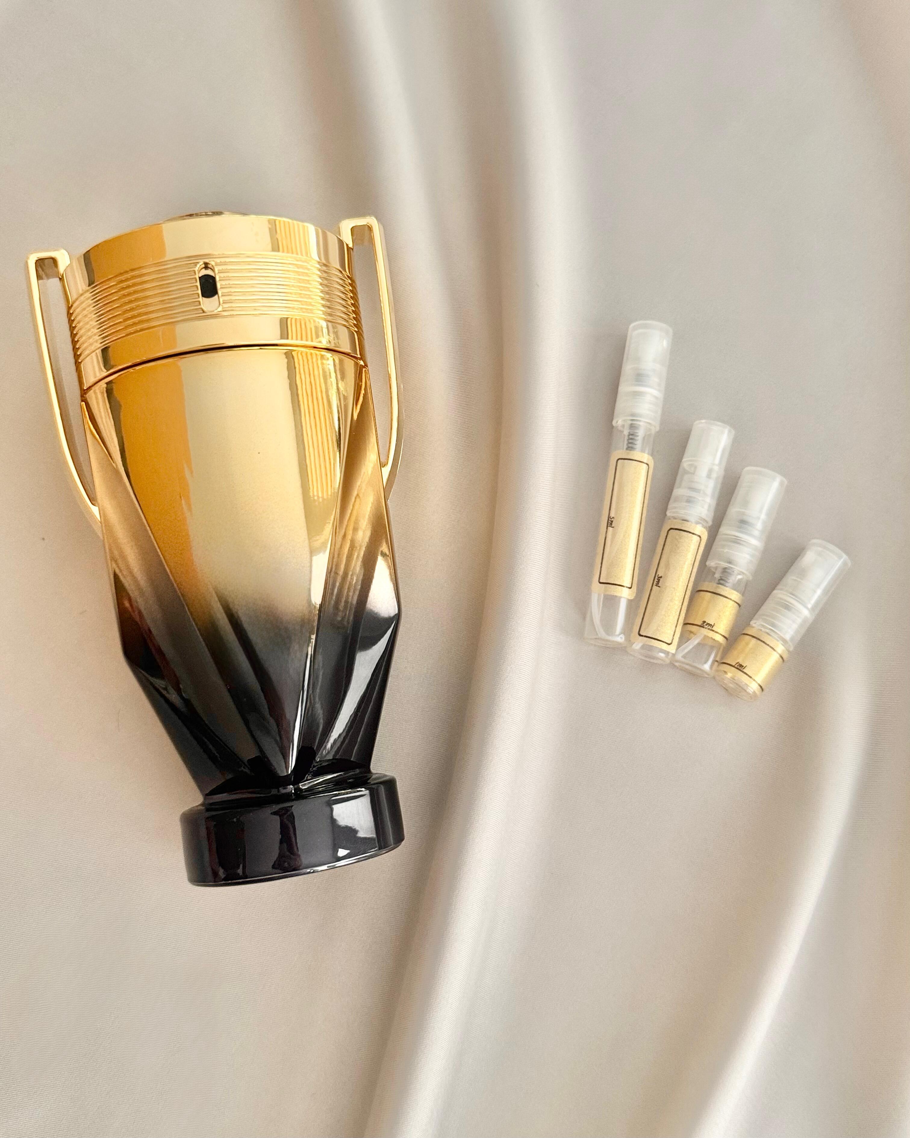 Rabanne Invictus Elixir with sample bottles