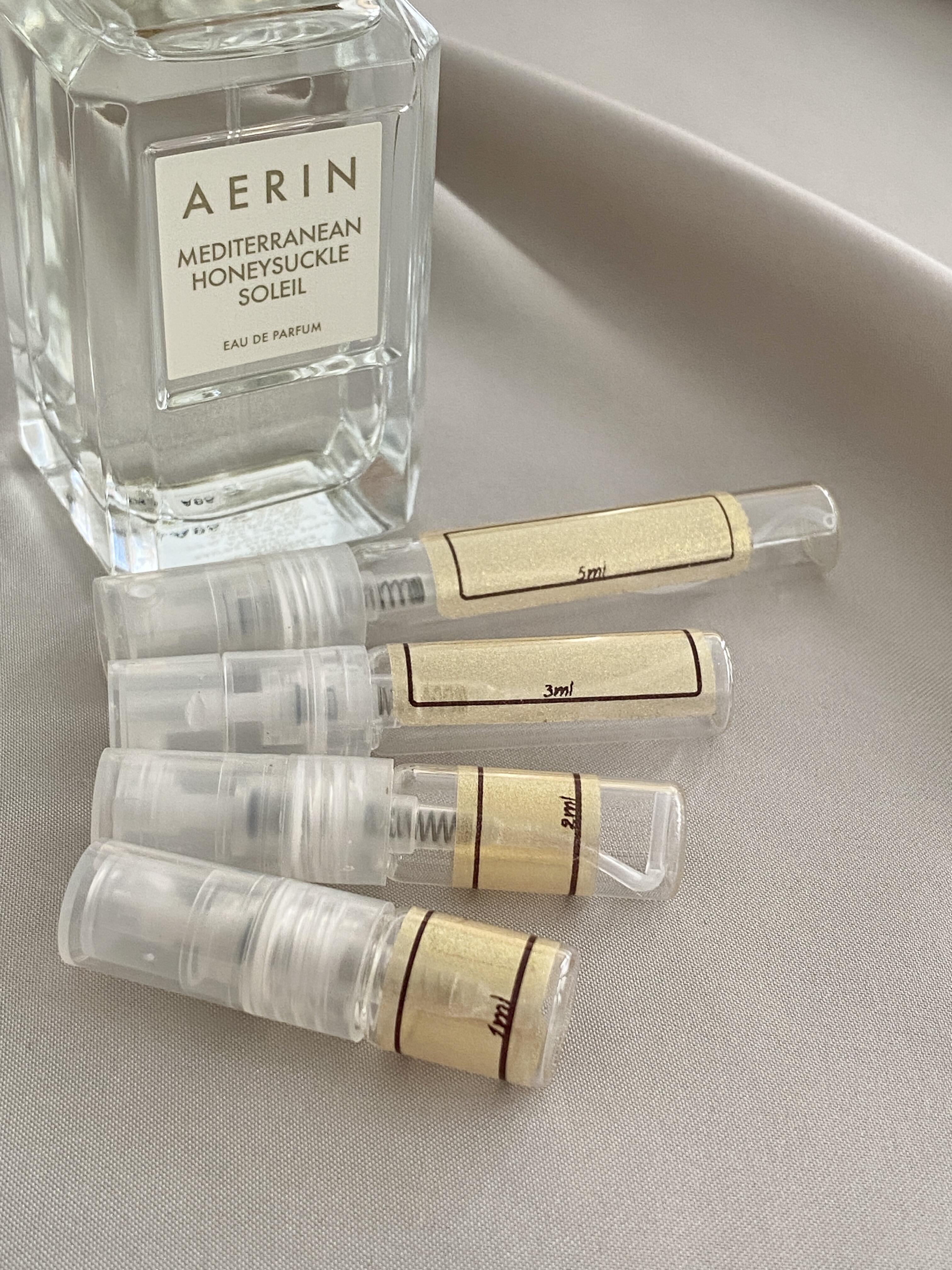 AERIN Mediterranean Honeysuckle Soleil and sample bottles