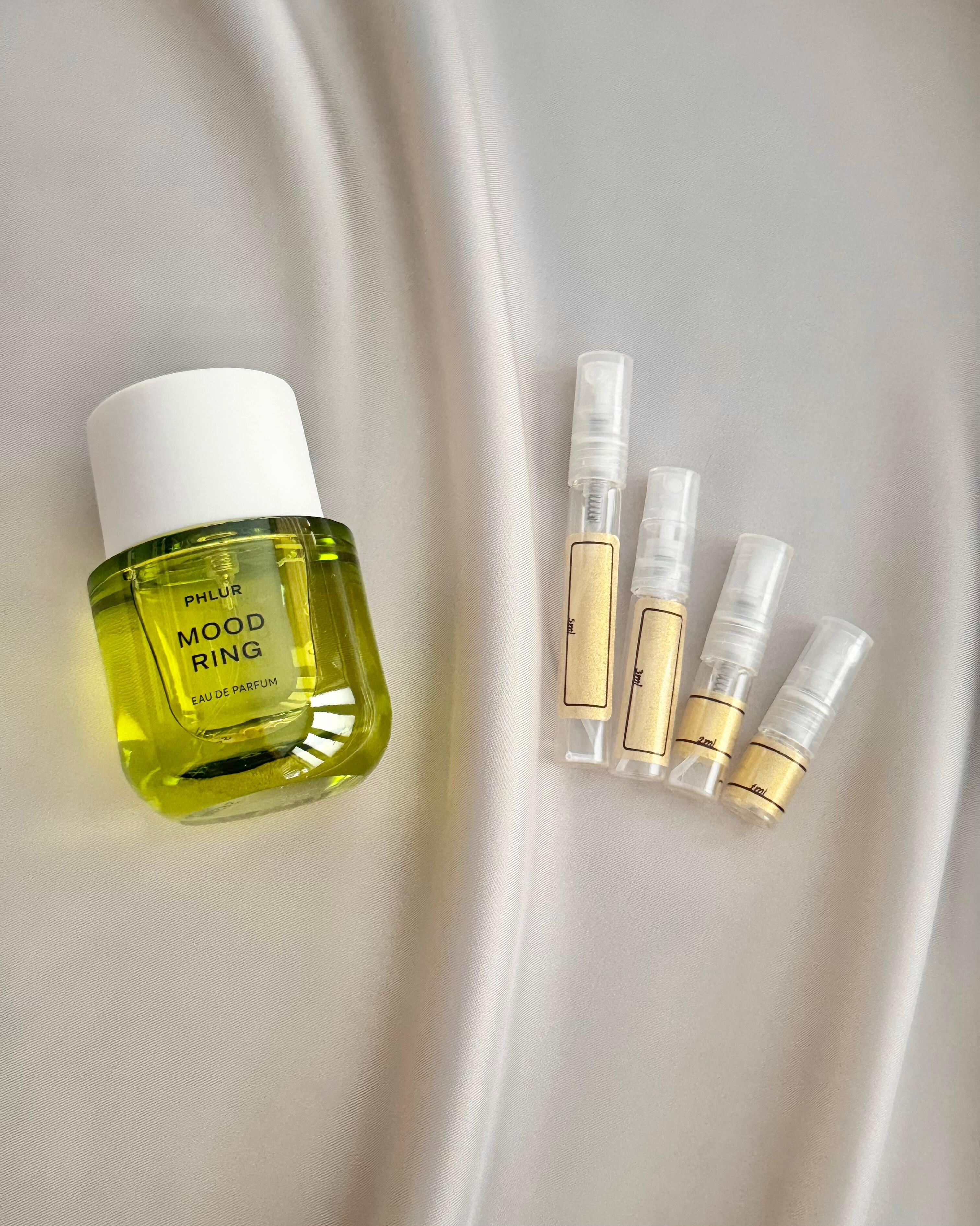 Phlur Mood Ring perfume and sample bottles