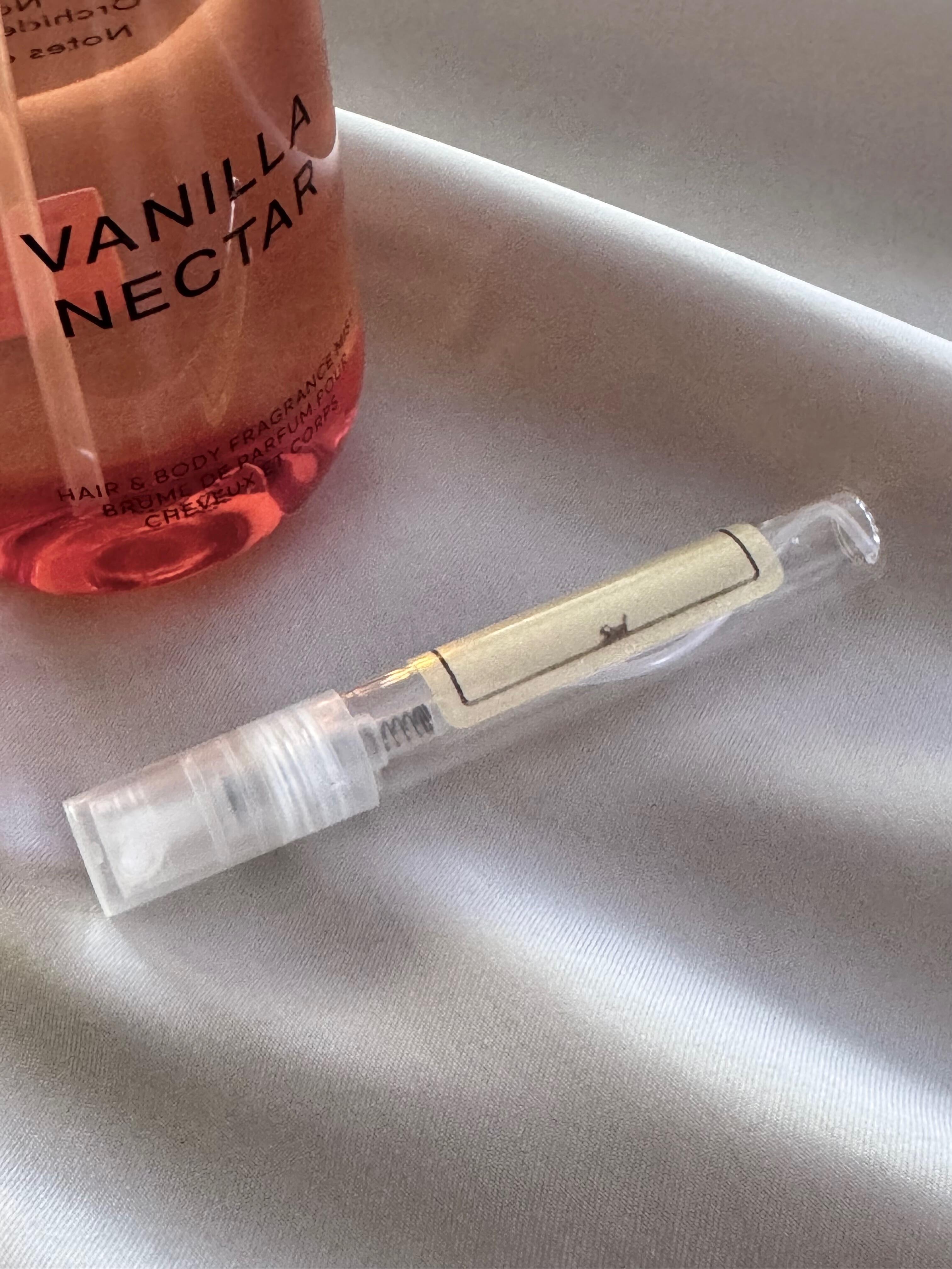 Phlur Vanilla Nectar and sample bottle