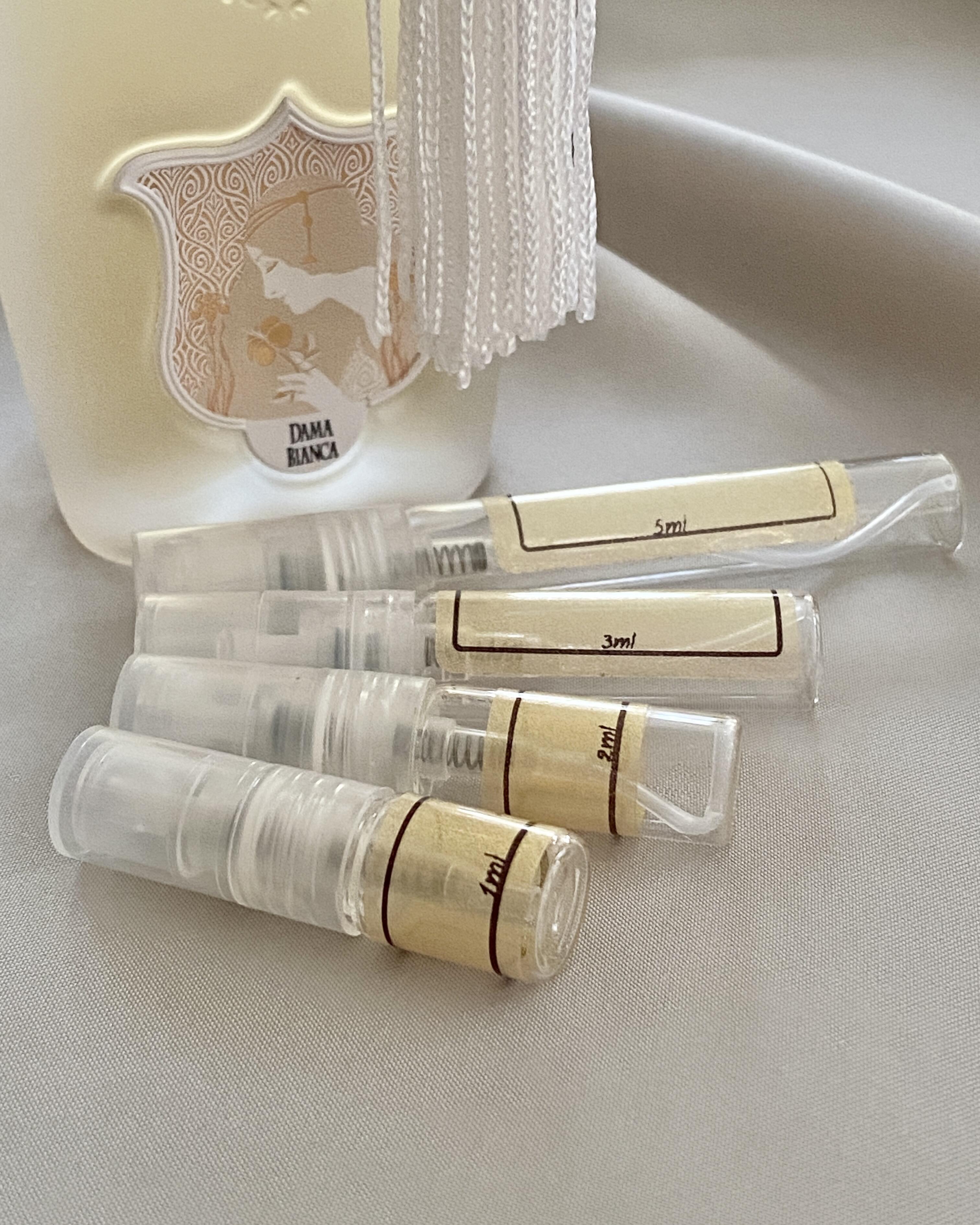Xerjoff Dama Bianca and sample bottles