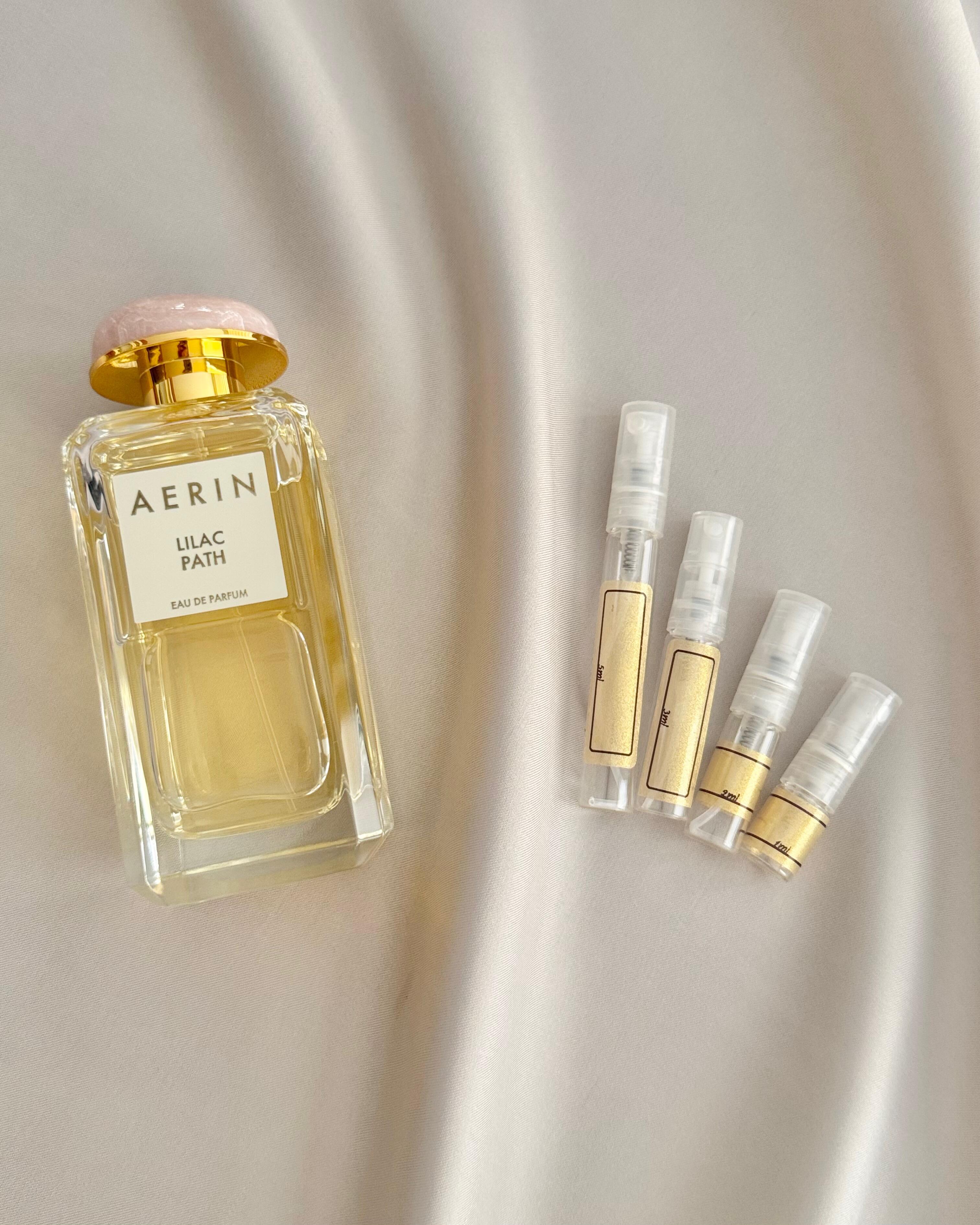 AERIN Lilac Path with sample bottles