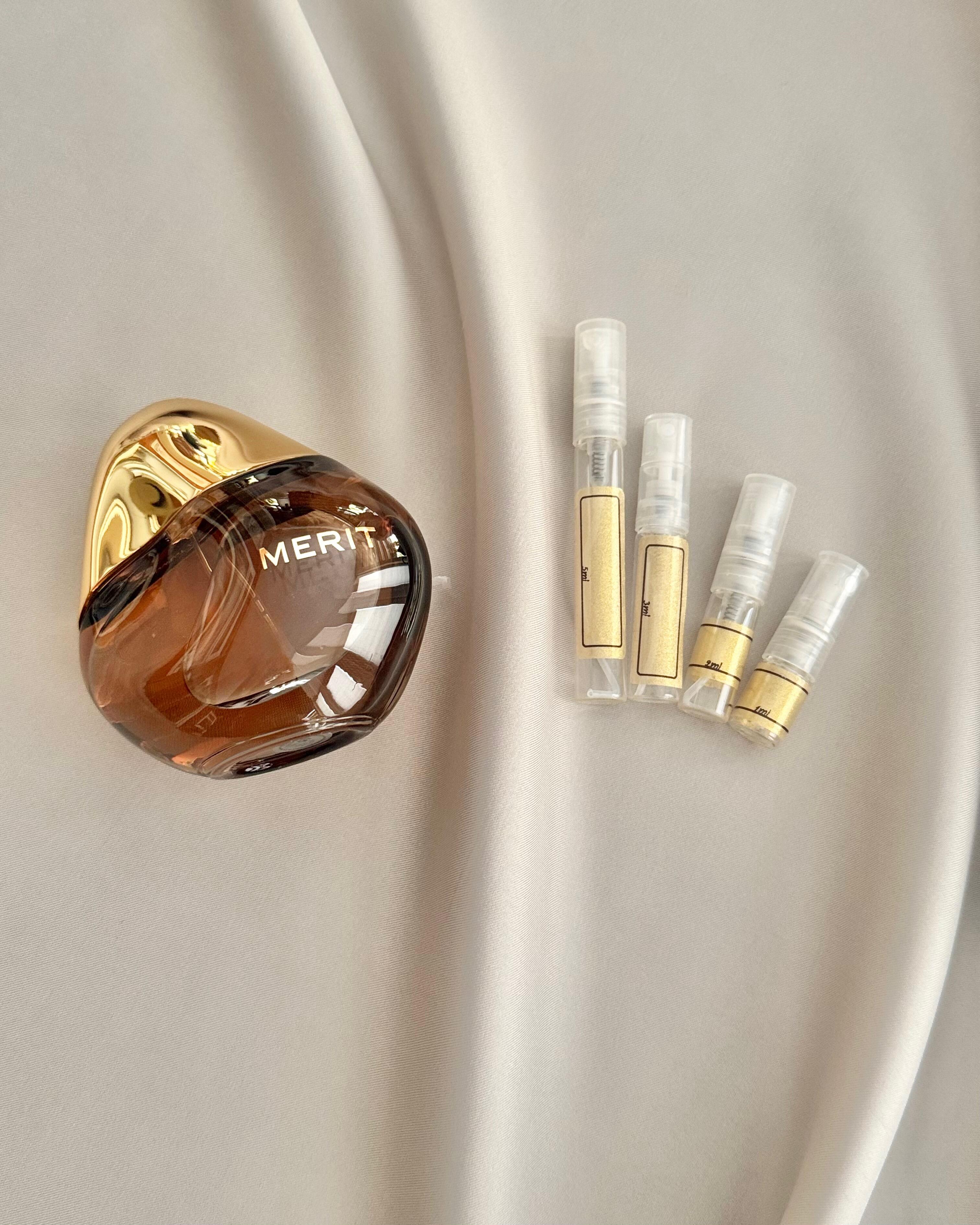 Merit Retrospect perfume with sample bottles