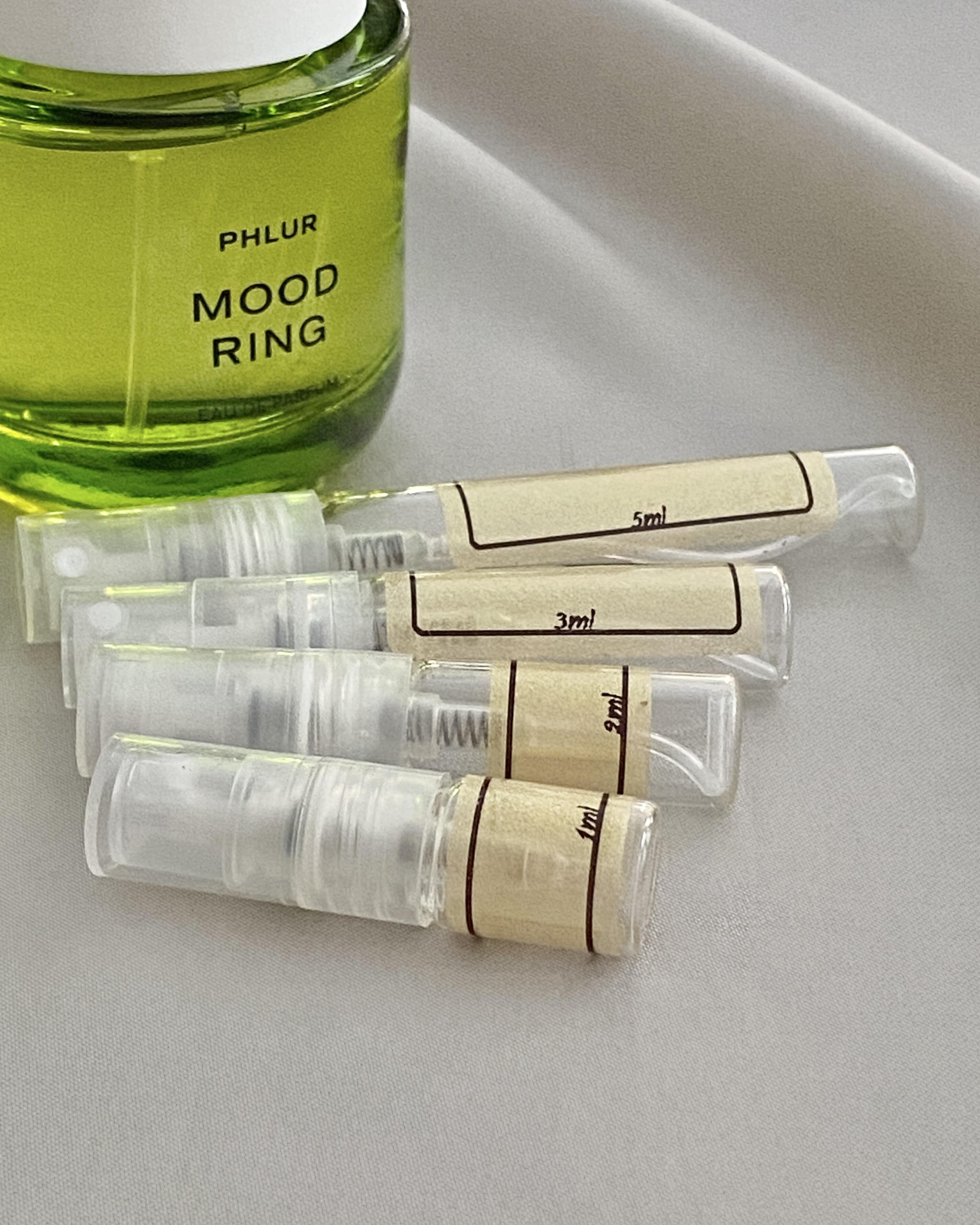 Phlur Mood Ring perfume with sample bottles