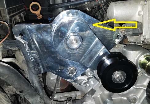 ATI DM003C-122 H.D. Tensioner Assembly - C6 Corvette 10 Rib. This is the new tensioner design without the eyebolt assembly, it is actuated just like a gates style with a ?? drive ratchet.
