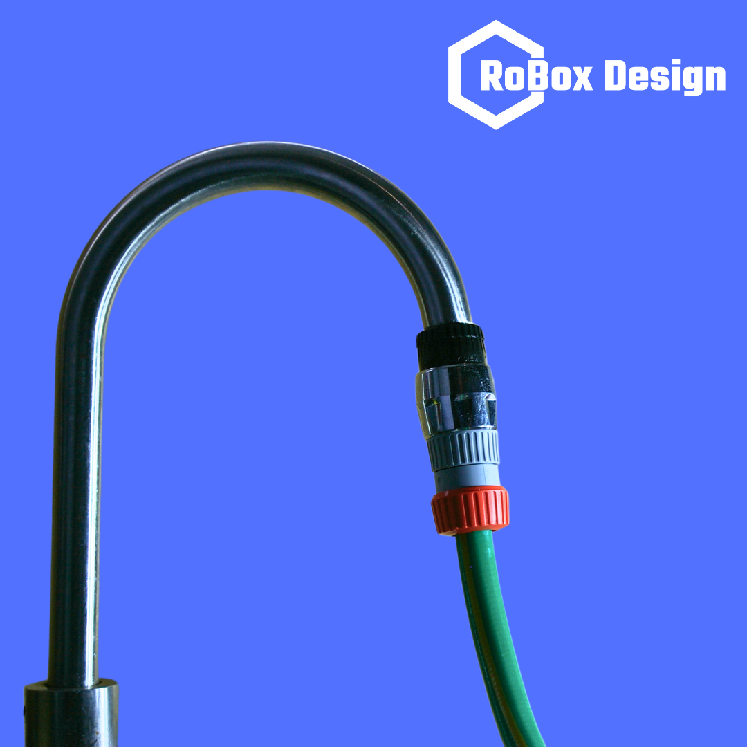 Photo showing garden hose secure on kitchen tap