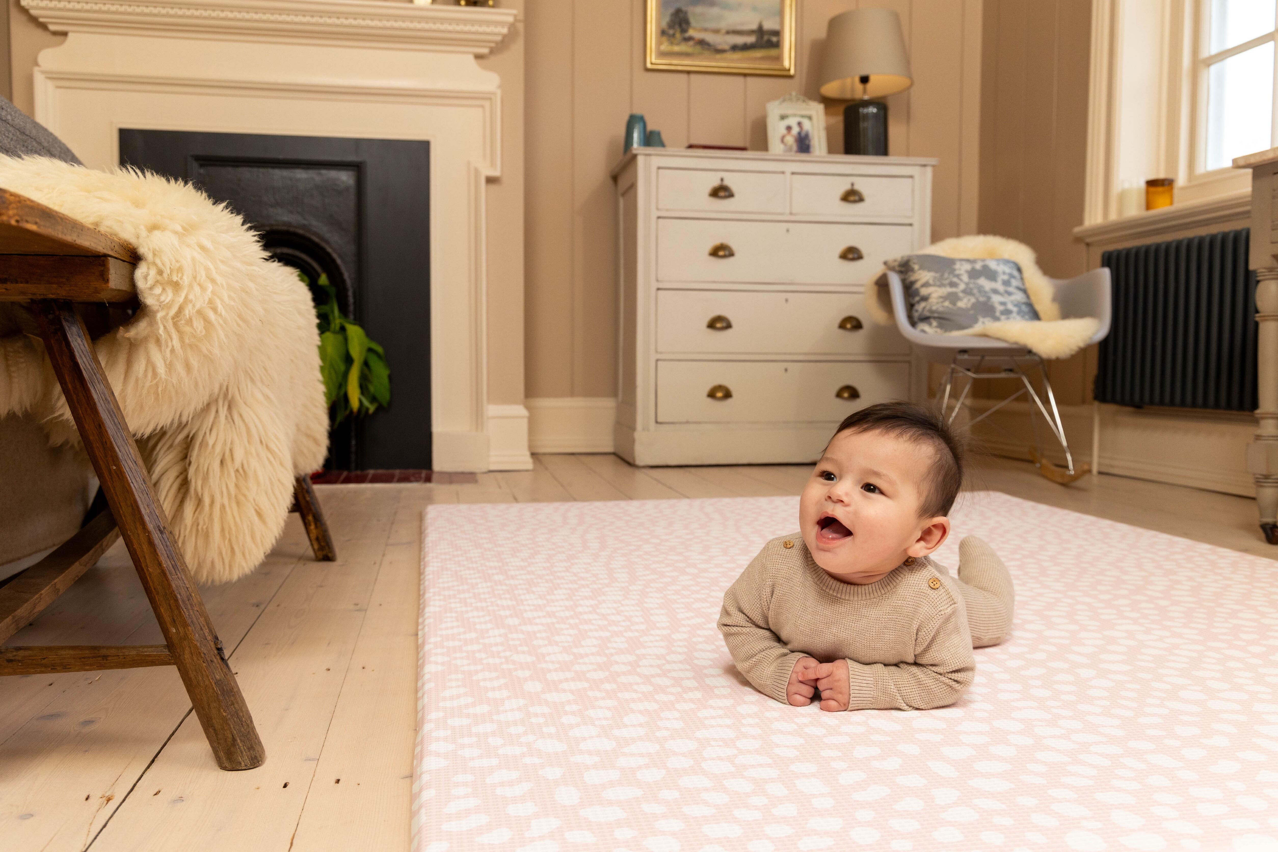 Blush Pink Darling Dalmatian playmat styled in a neutral nursery – 1.5 cm thick reversible baby mat for everyday playtime