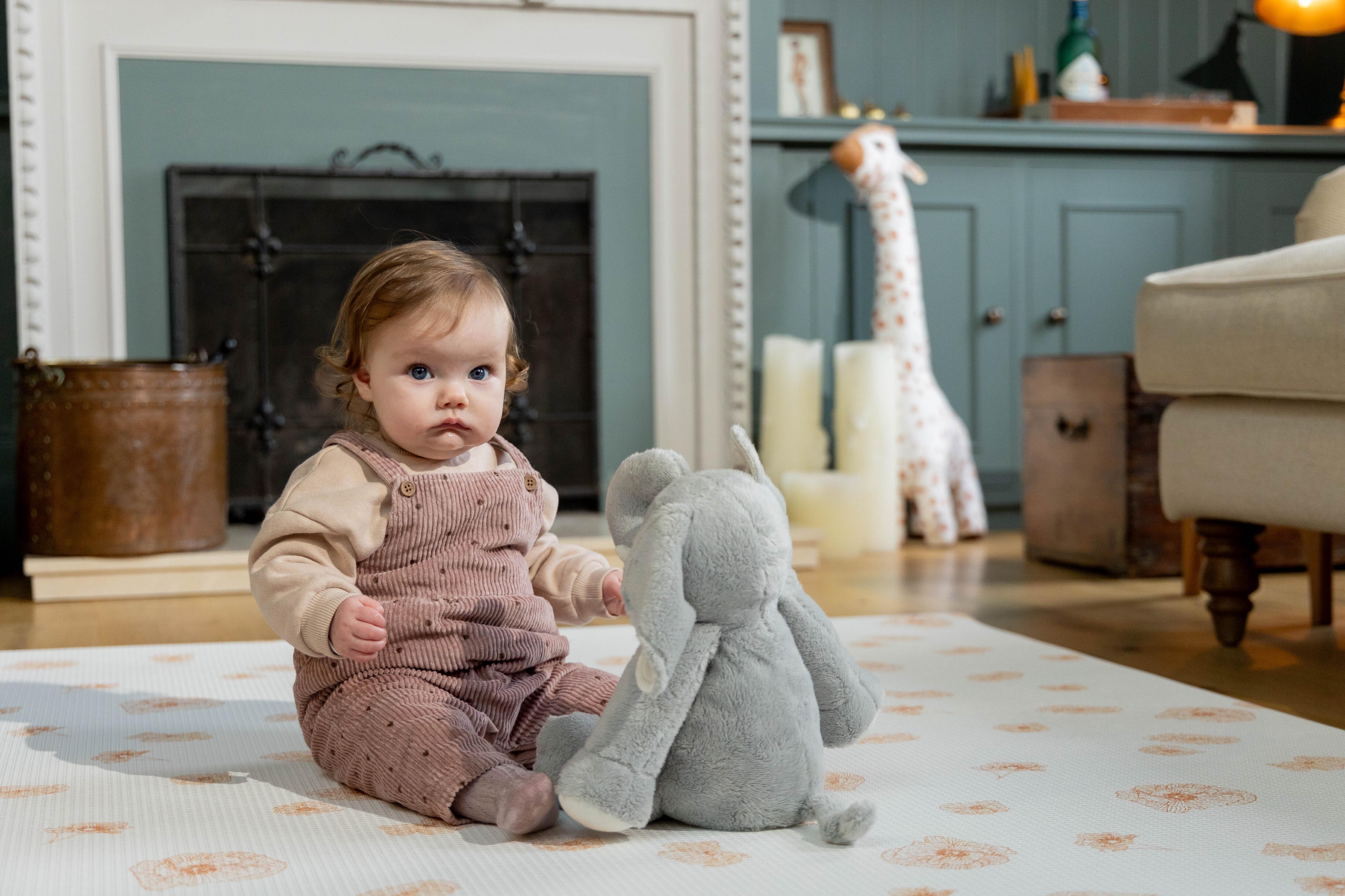Large Flora Playmat styled in a calm nursery – reversible floral baby mat providing comfort and safety by Little Fae
