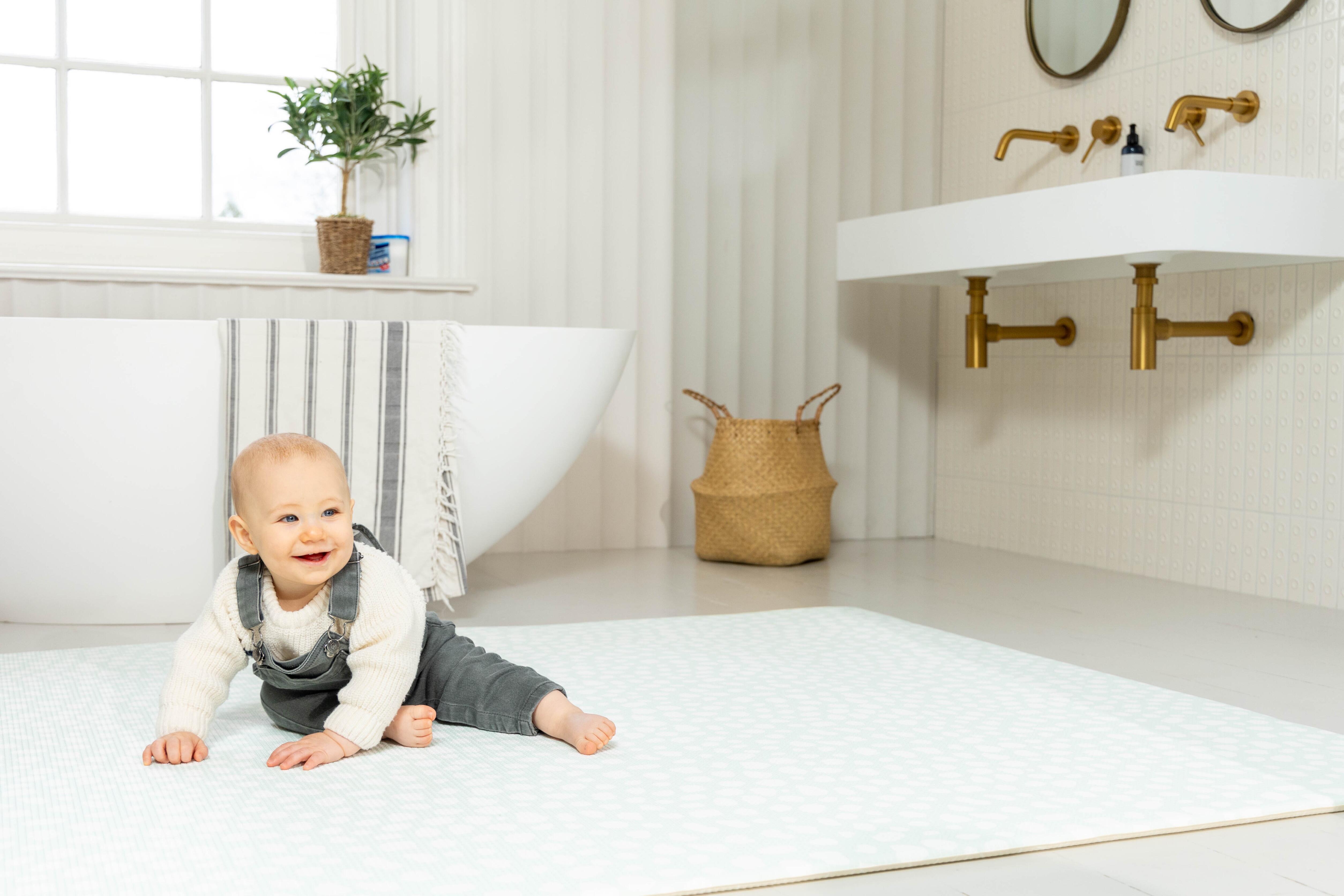 Lifestyle image of Soft Mint Darling Dalmatian Playmat – reversible cushioned foam mat for stylish interiors by Little Fae
