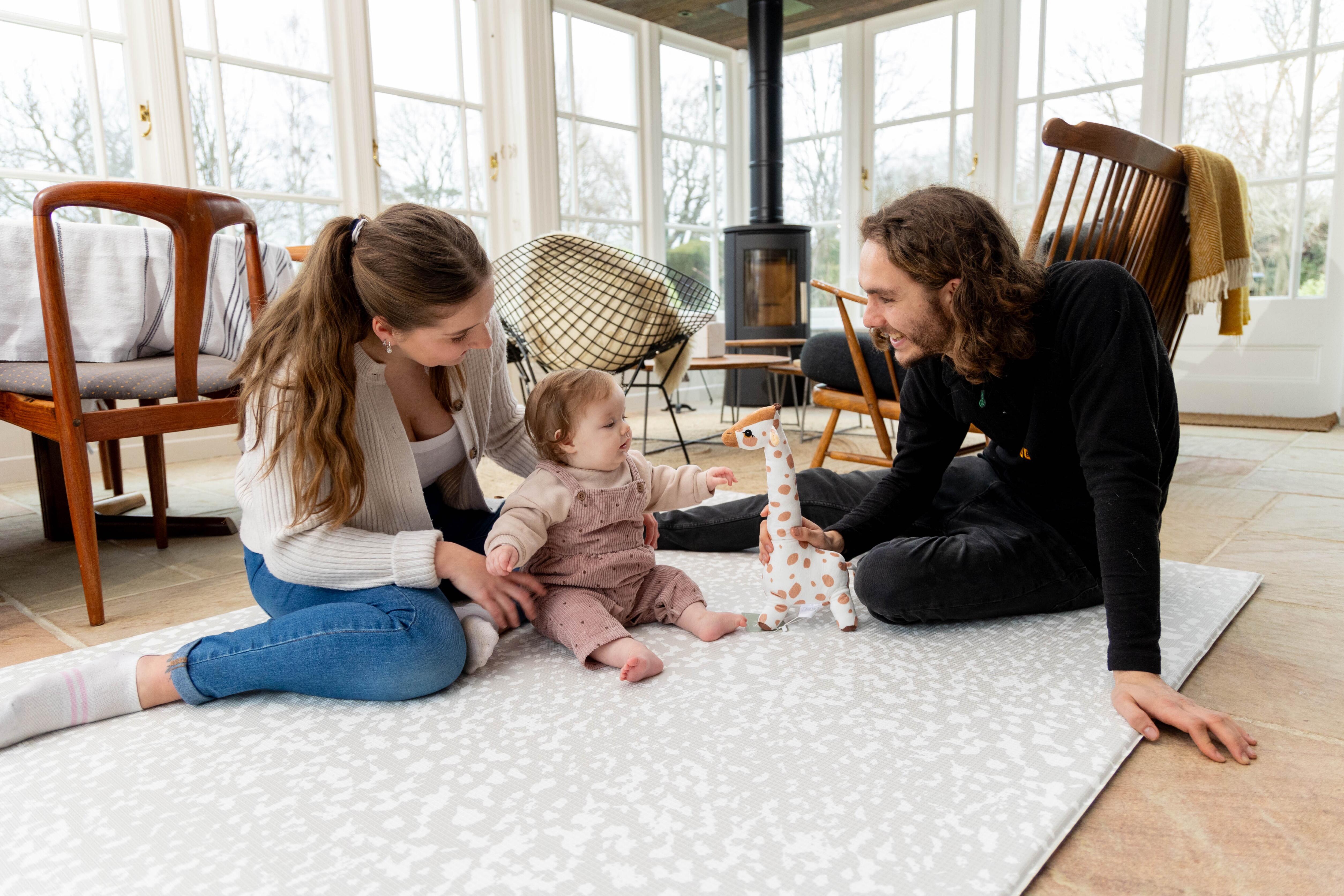 Luxury Greige Speckled Kisses baby playmat complementing contemporary décor