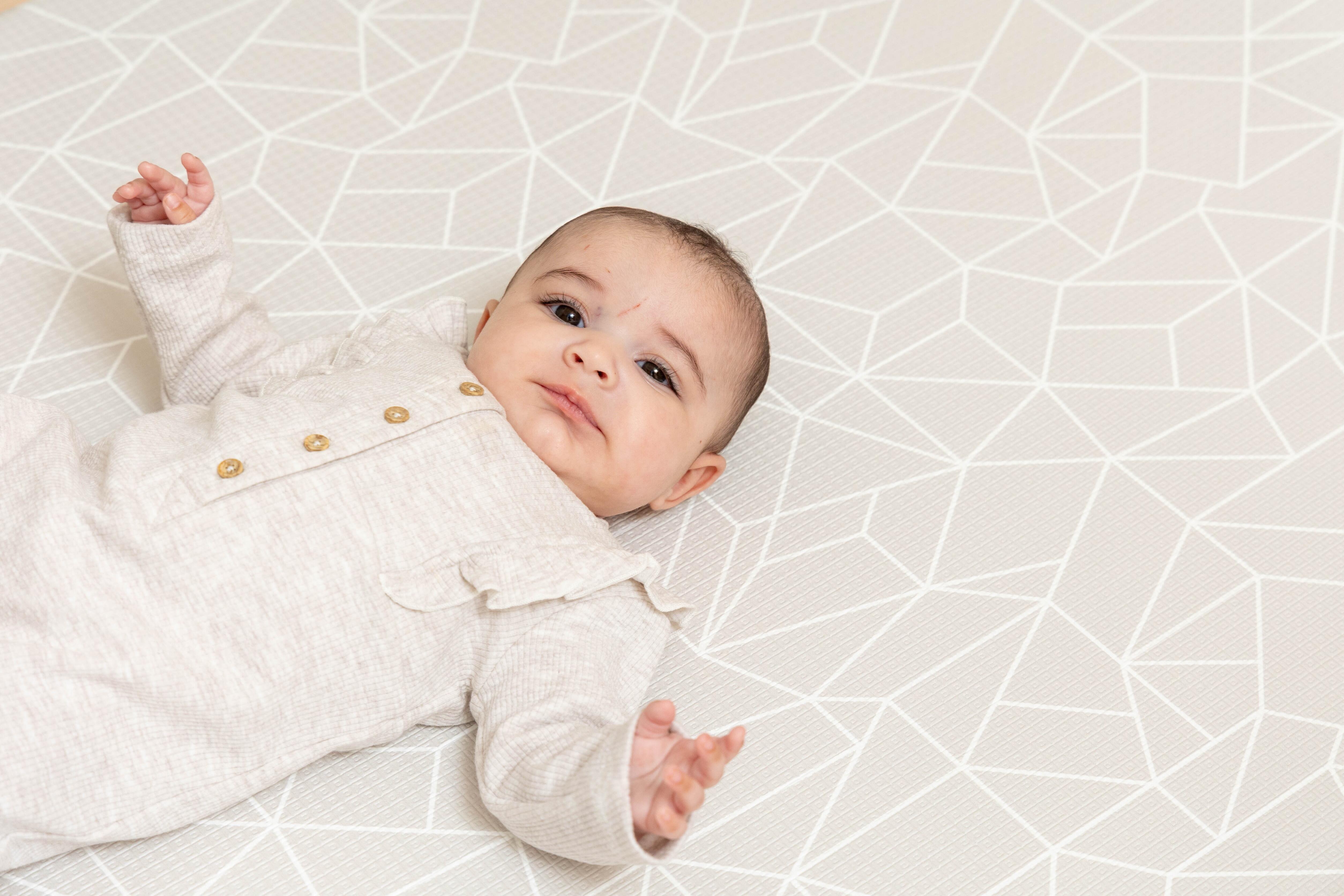 Medium reversible Nordic Explorer Playmat in warm Greige tones for modern décor