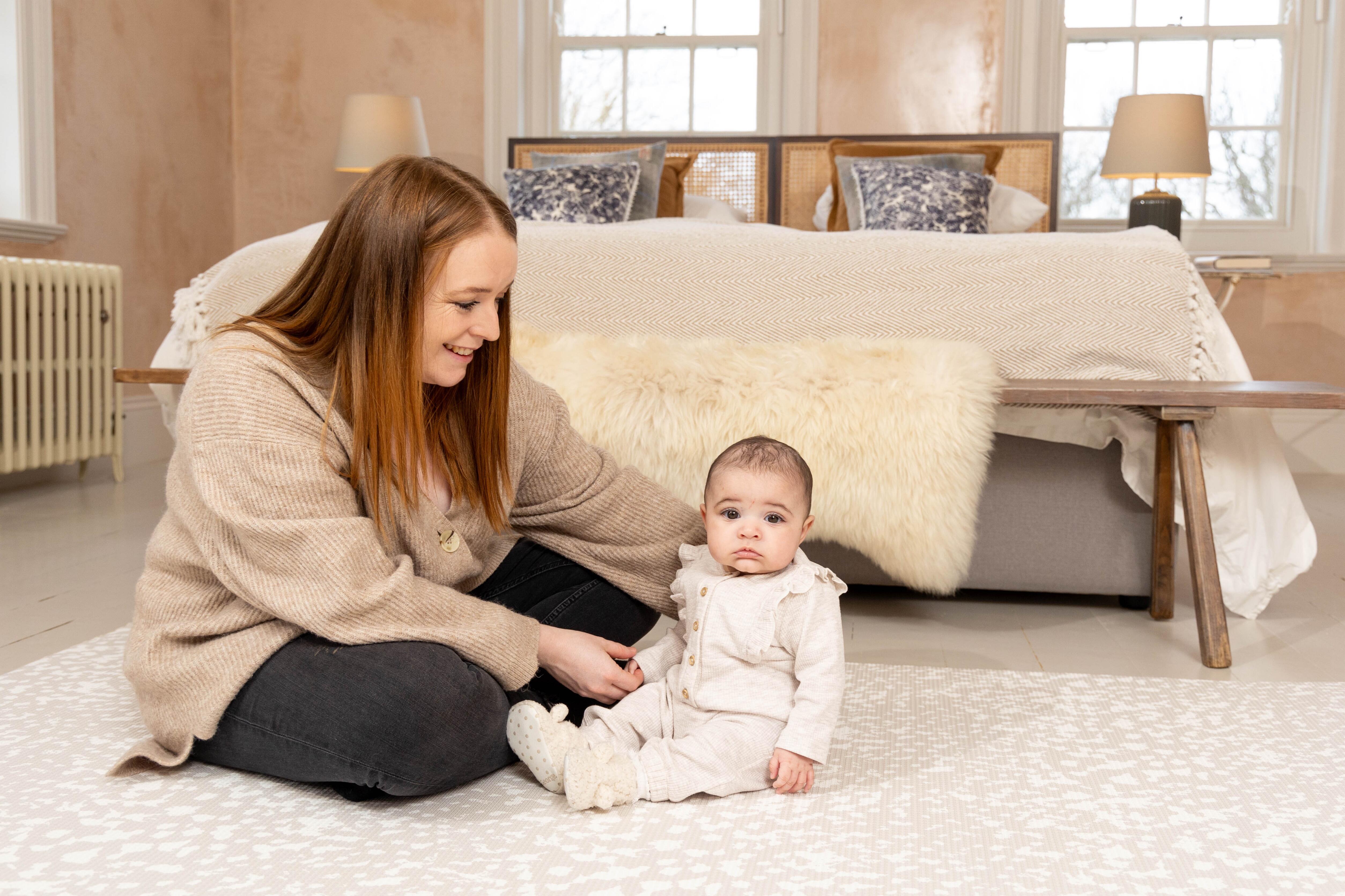 Speckled Kisses Playmat – Luxury Greige design offering a calming, non-toxic, and cushioned play surface.