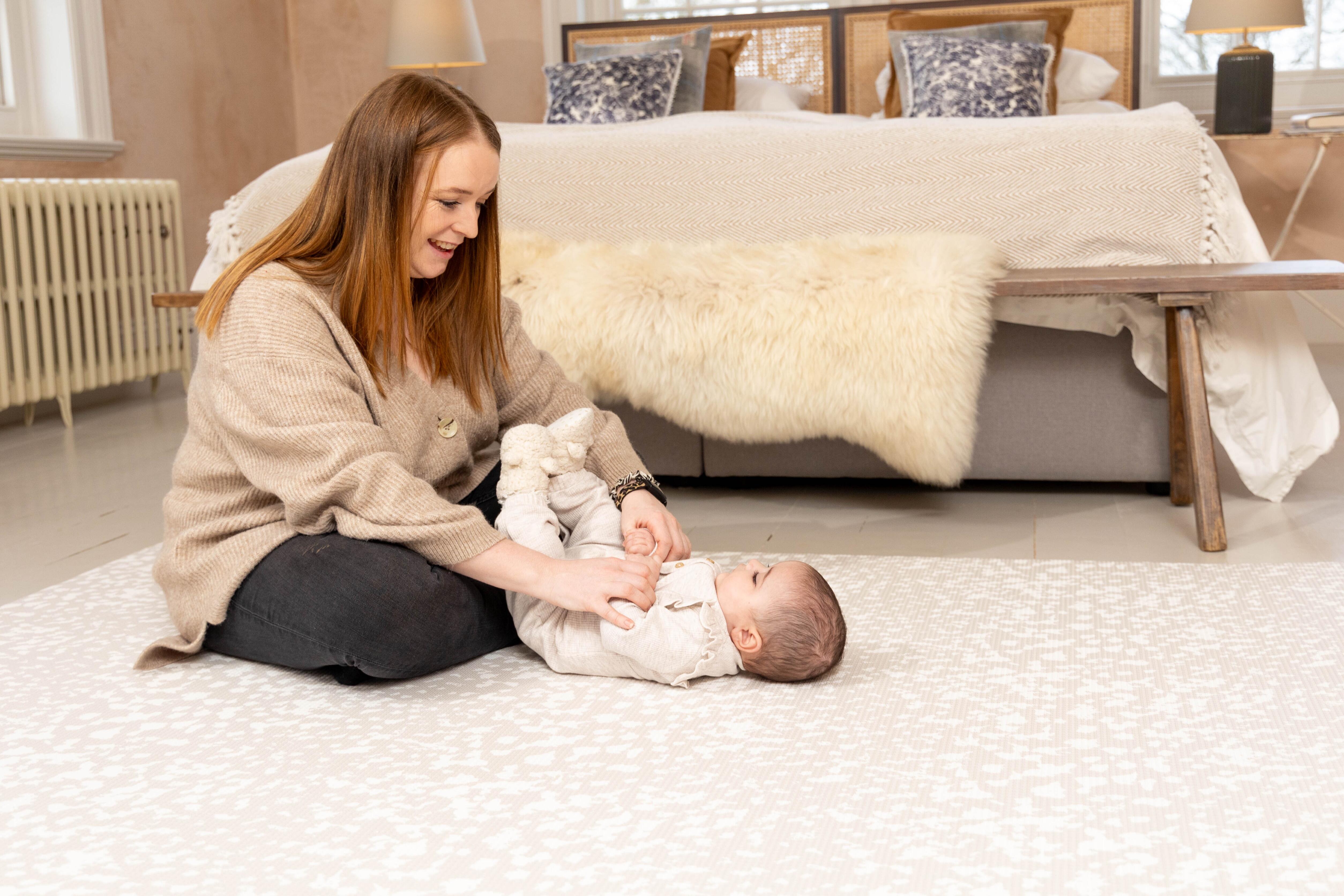 Baby playing on Luxury Greige reversible playmat – soft 1.5 cm cushioned non-toxic design by Little Fae